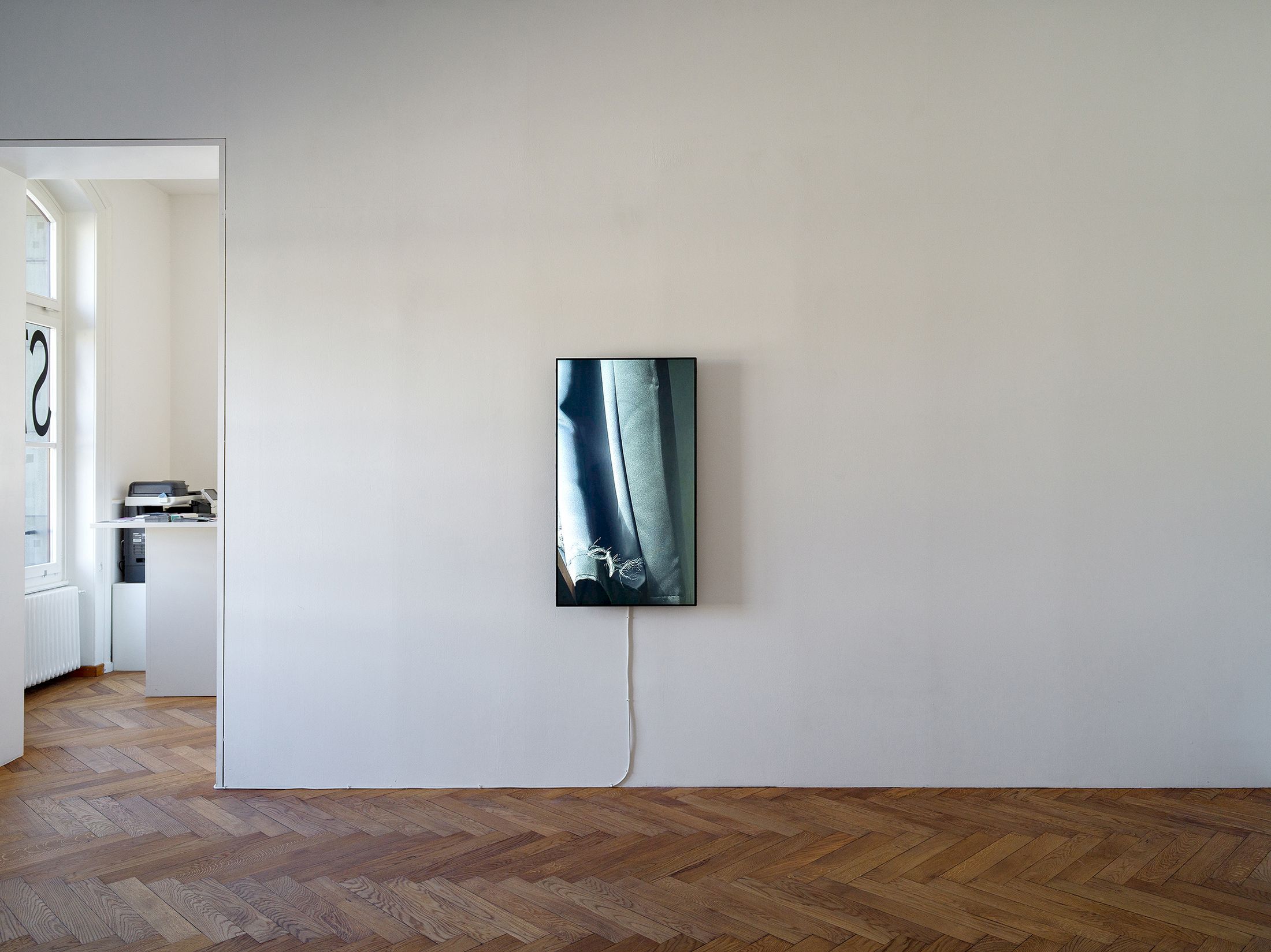 Exhibition View Solo Show Nancy Lupo «Tom ; view on In Disko, 2025, 4 K Video, 20:07 min» at Stadtgalerie Bern, Bern, 2026 / Photo: Cedric Mussano / Courtesy: the artist and Stadtgalerie Bern