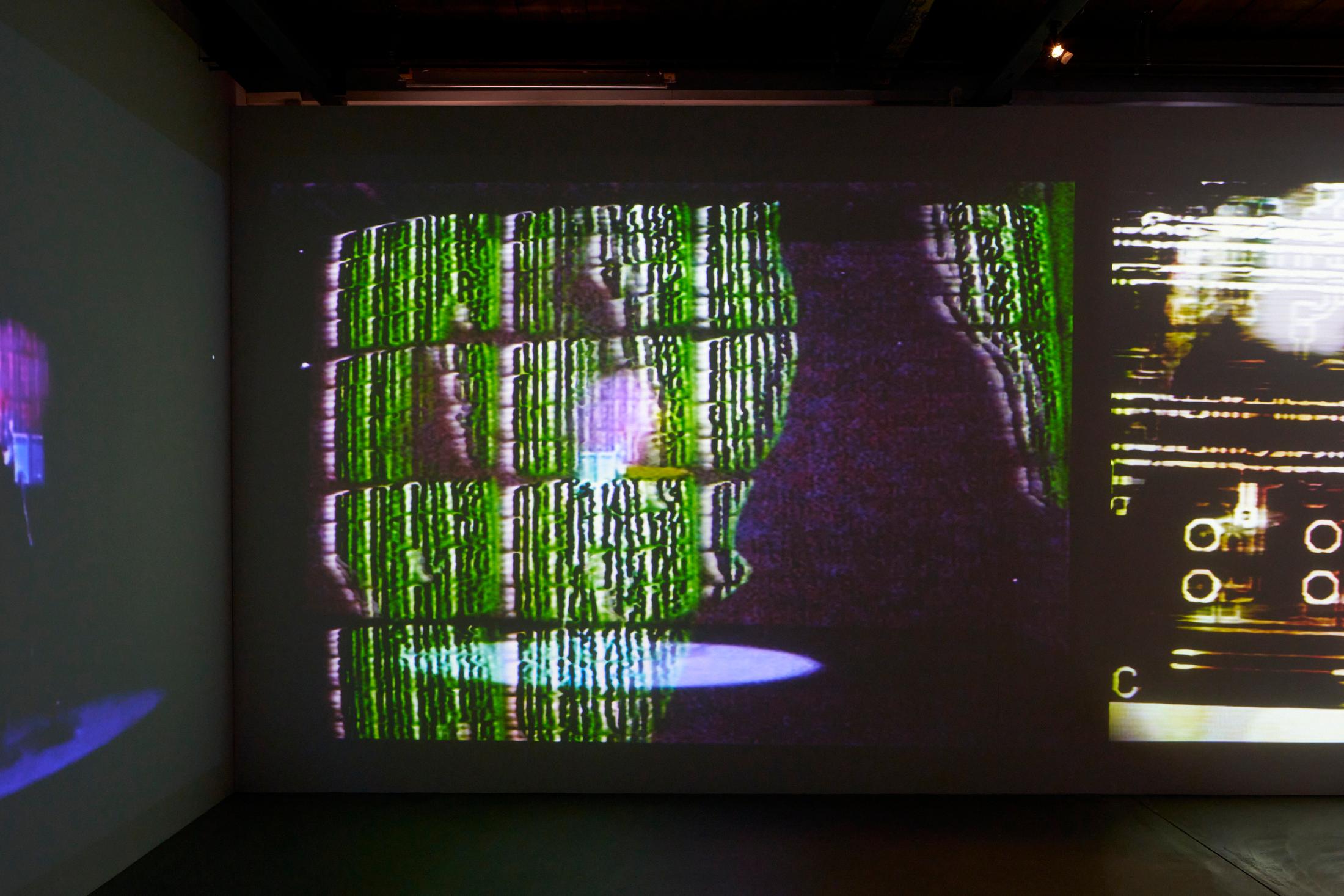 Exhibition View Solo Show [ a n y m a ] Michael Egger «Feedback Follies; view on Synkie (projection), 2010/2024» at Kunsthalle Fri Art Fribourg, 2024-2025 / Photo: Guillaume Python / Courtesy of the artist and Kunsthalle Friart Fribourg