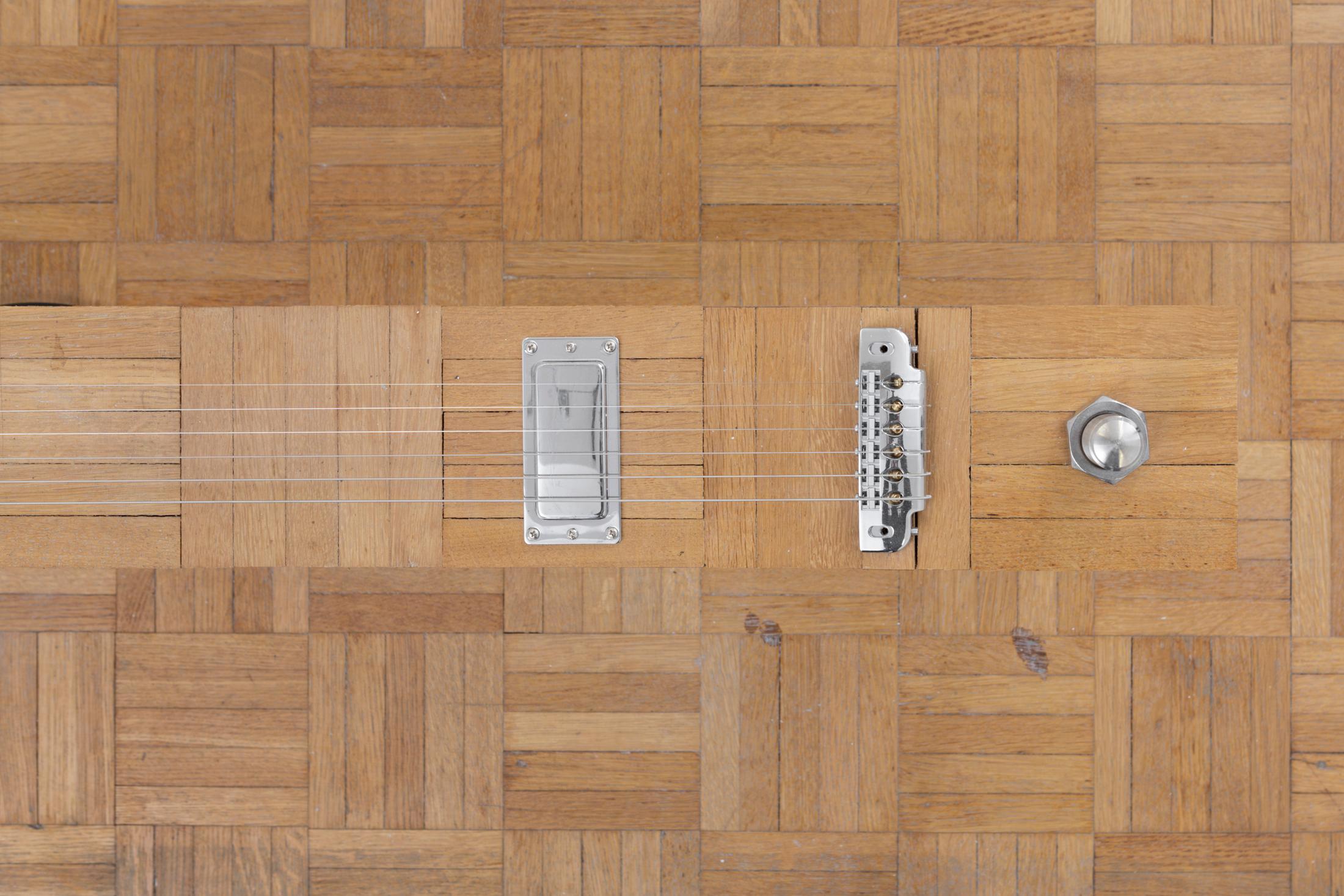 Exhibition View Solo Show alfatih «l’enfant terrible; view on toccata, samuel, 2024, wood, guitar components, levelling feet, 80 × 12 × 34cm and toccata, x, 2024, wood, guitar components, levelling feet, 80 × 12 × 34cm» at Sentiment, Zurich-Oerlikon, 2024 / Photo: Philipp Rupp and Julien Gremaud / Courtesy: the artist and Sentiment