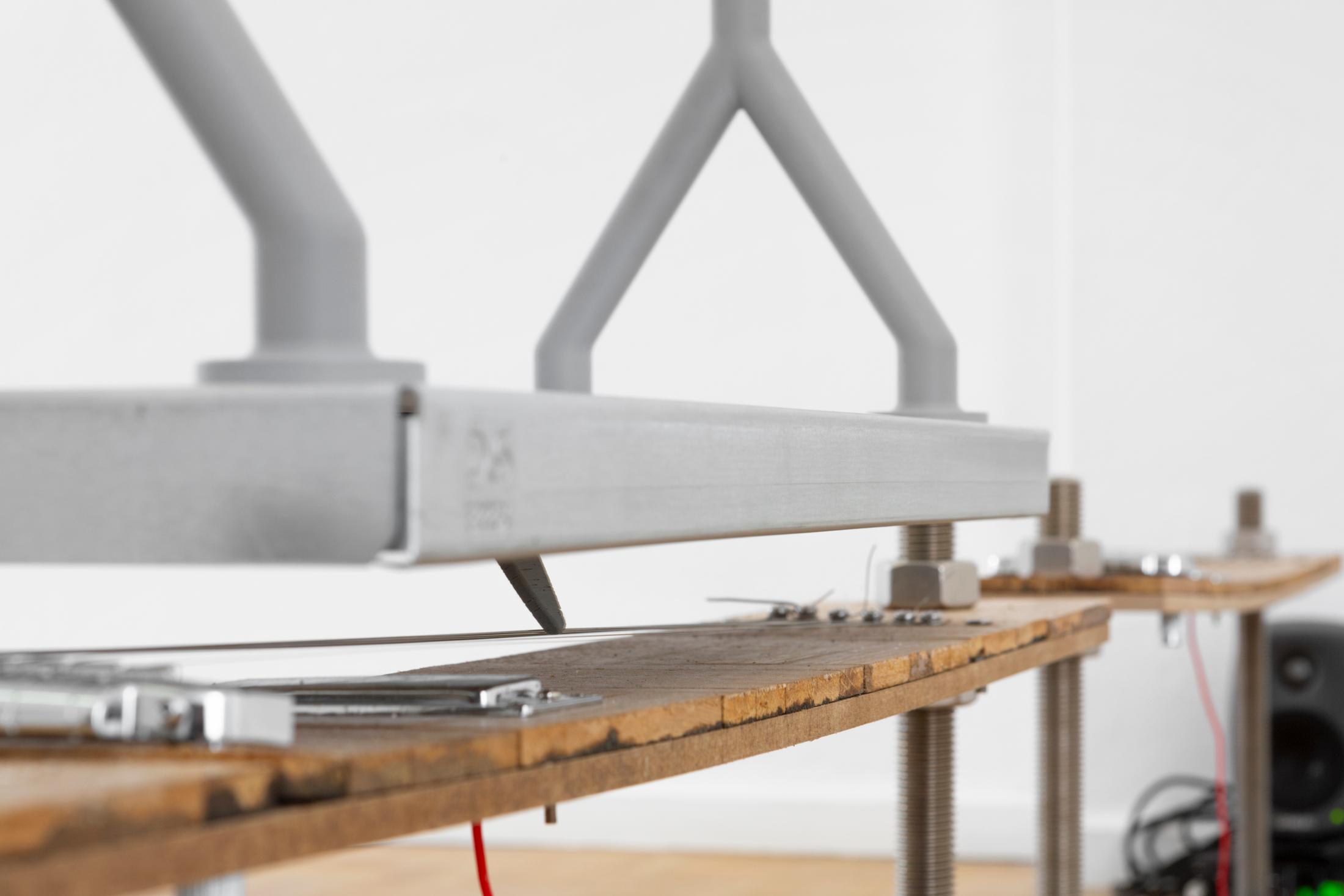 Exhibition View Solo Show alfatih «l’enfant terrible; view on toccata, samuel, 2024, wood, guitar components, levelling feet, 80 × 12 × 34cm and toccata, x, 2024, wood, guitar components, levelling feet, 80 × 12 × 34cm» at Sentiment, Zurich-Oerlikon, 2024 / Photo: Philipp Rupp and Julien Gremaud / Courtesy: the artist and Sentiment