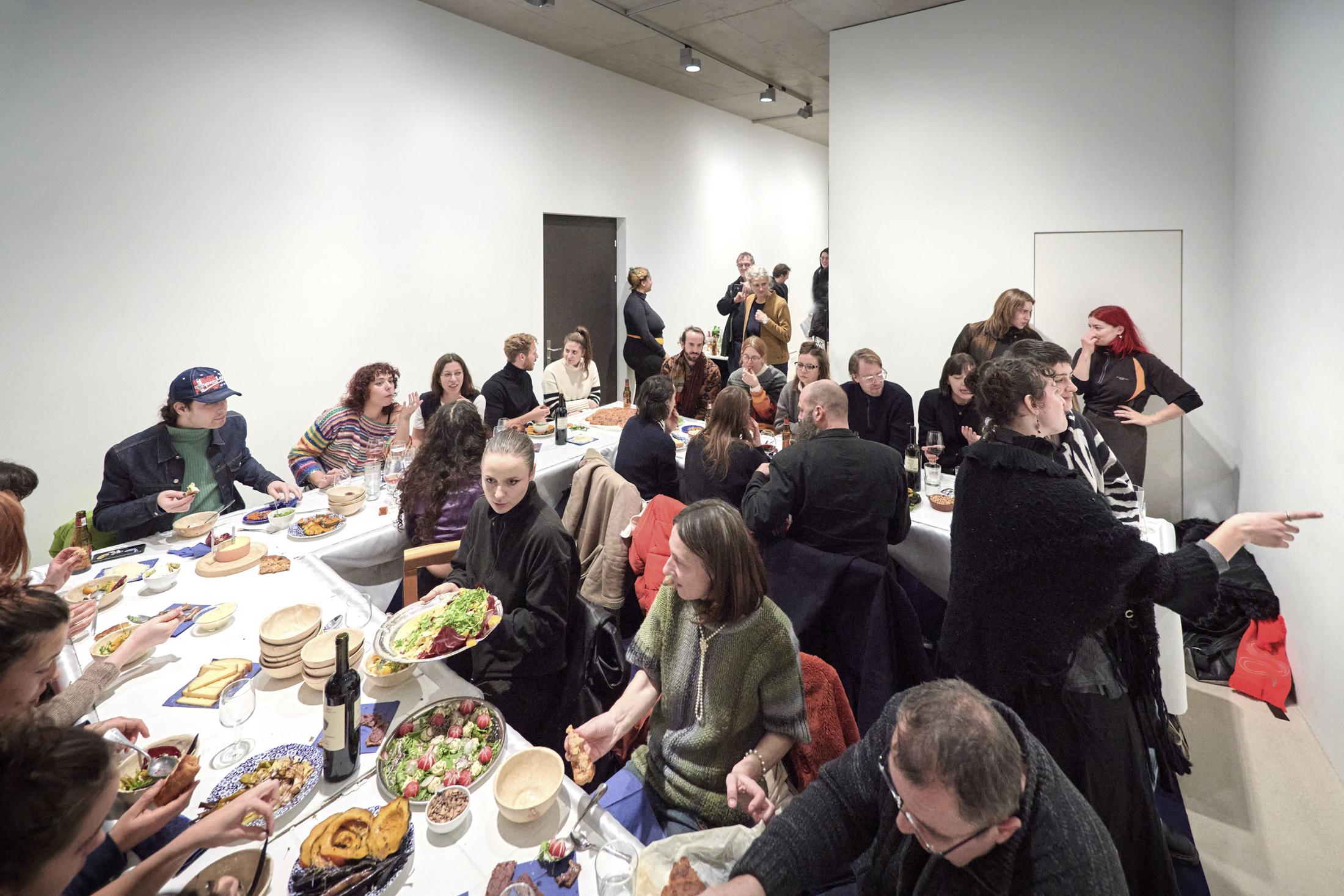 Exhibition View Debbie Alagen Solo Show «One reason to come brings many to stay; view on Debbie Alagen, Tales table, 2023, wood, ceramic tiles, foam tubes, synthetic fabric, delicious food, dimension 350 x 350 x 72 cm» at Windhager von Kaenel, Zurich, 2023 / Photo: Anna Maysuk / Courtesy: the artist and Windhager von Kaenel