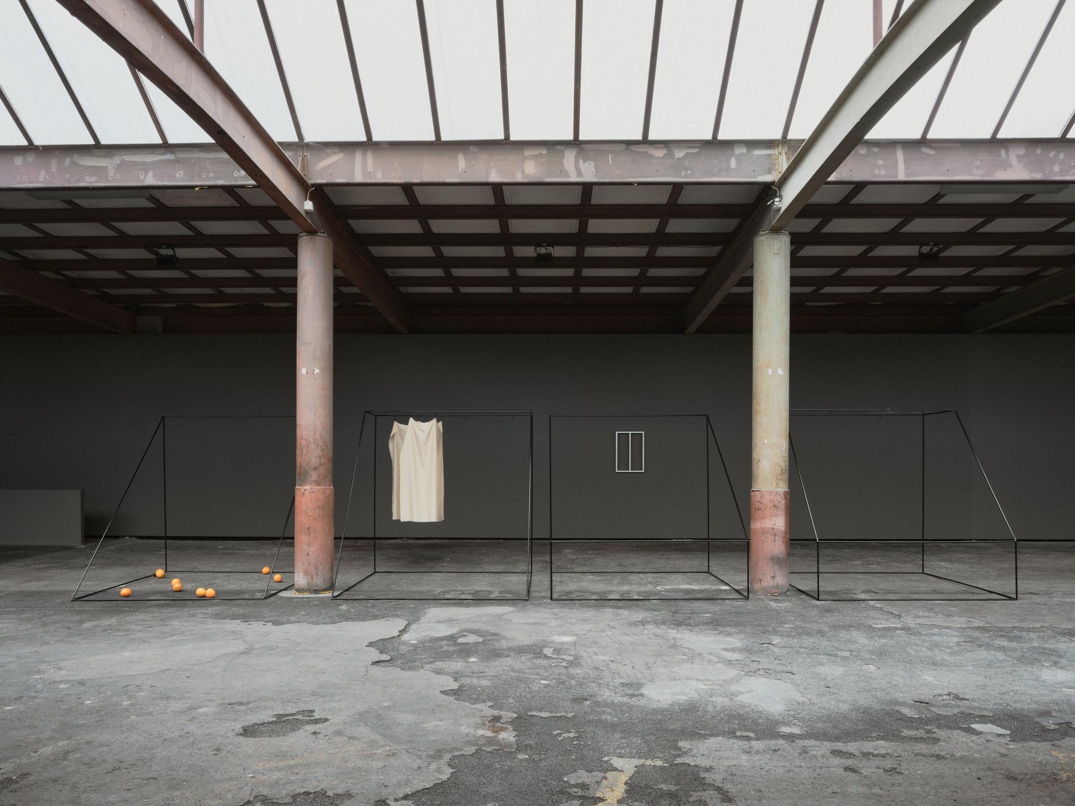 Exhibition View Solo Show Edit Oderbolz «I Have No Roots in This Life; view on Edit Oderbolz, I Hear the Cold, 2024, (4-part) Metal, glass, acrylic, wood, fabric 2 x 2 x 2 m each» at Kunsthalle Arbon, Arbon, 2024 / Photo: Ladina Bischof / Courtesy: The artist and Kunsthalle Arbon