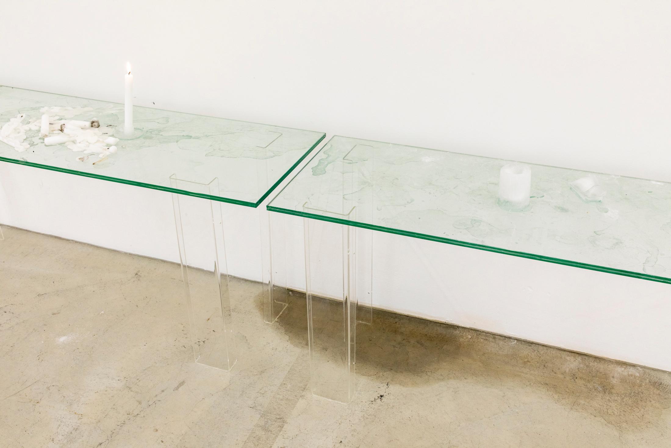 Exhibition View Group Show «Instant Rumor; view on Amélie Bodenmann, Slipstream, glass tables, ice (waterglas, beer bottle, candleholder, ashtray, chair) Installation variable, 2024» at Ausstellungsraum Klingental, Basel, 2024 / Photo: Nina Rieben / Courtesy: the artists and Ausstellungsraum Klingental