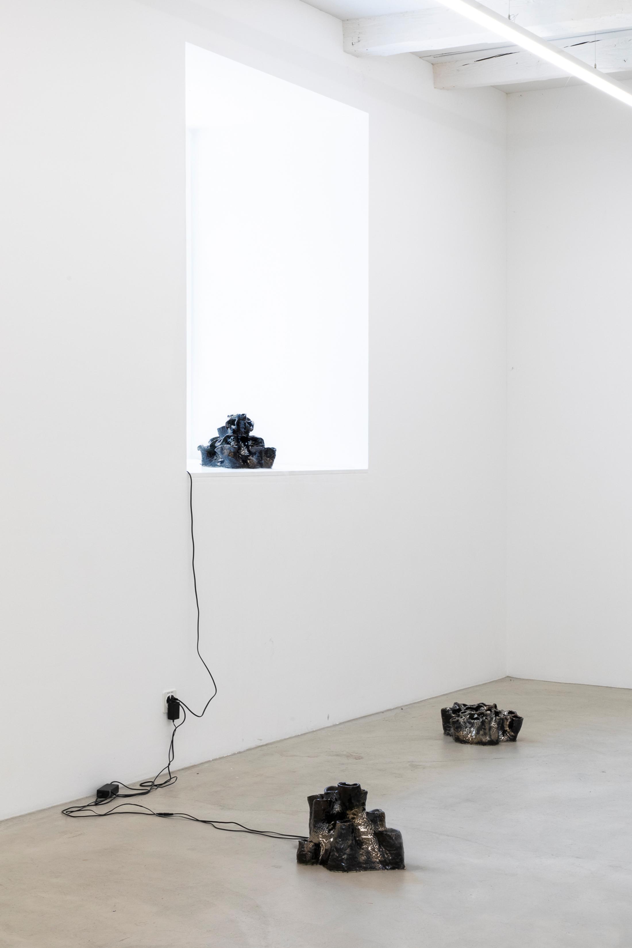 Exhibition View Group Show «Instant Rumor; view on Leonardo Bürgi Tenorio, soil memories & end of summer, glazed ceramic, water, aroma diffusor, hydrolate, variable dimensions, 2024» at Ausstellungsraum Klingental, Basel, 2024 / Photo: Nina Rieben / Courtesy: the artists and Ausstellungsraum Klingental