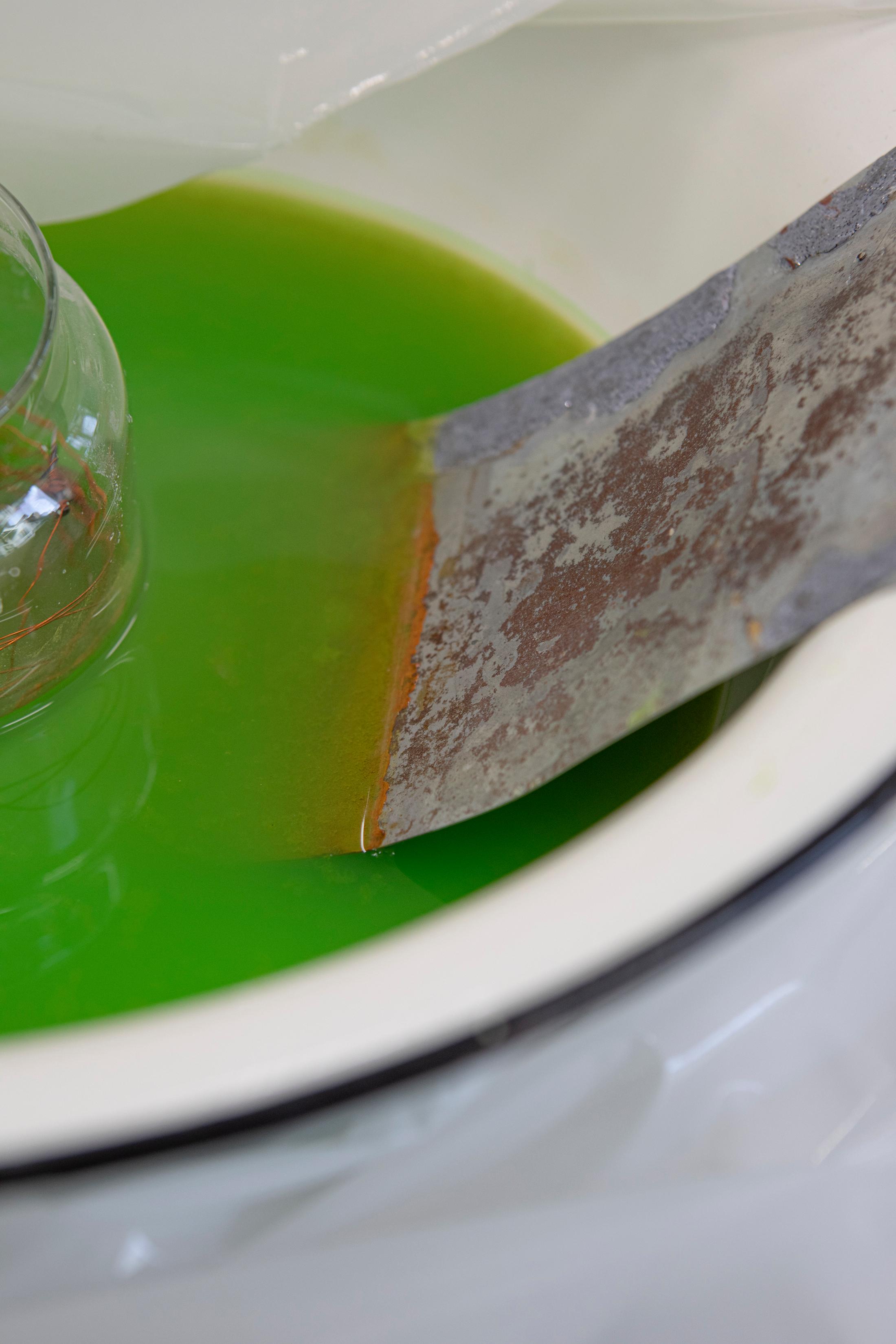 Exhibition View Solo Show Julia Znoj «BASS MY TRESPASS ; view on Setup (Direct Current)(detail), 2025, laboratory power supply, zinc electrolyte, water, paint, steel, aluminum, paper, glue, glass, wire, found objects, size variable» at Krone Couronne, Biel/Bienne, 2025 / Photo: Michal Schorro / Courtesy: the artist and Krone Couronne