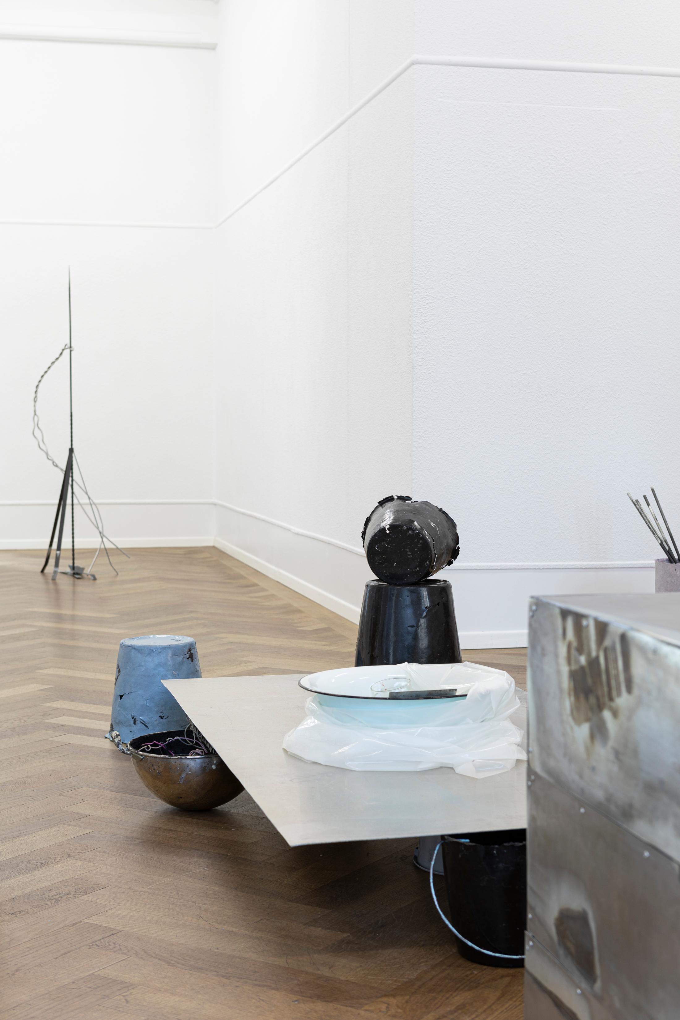 Exhibition View Solo Show Julia Znoj «BASS MY TRESPASS ; view on Setup (Direct Current) (detail), 2025, laboratory power supply, zinc electrolyte, water, paint, steel, aluminum, paper, glue, glass, wire, found objects, size variable» at Krone Couronne, Biel/Bienne, 2025 / Photo: Michal Schorro / Courtesy: the artist and Krone Couronne