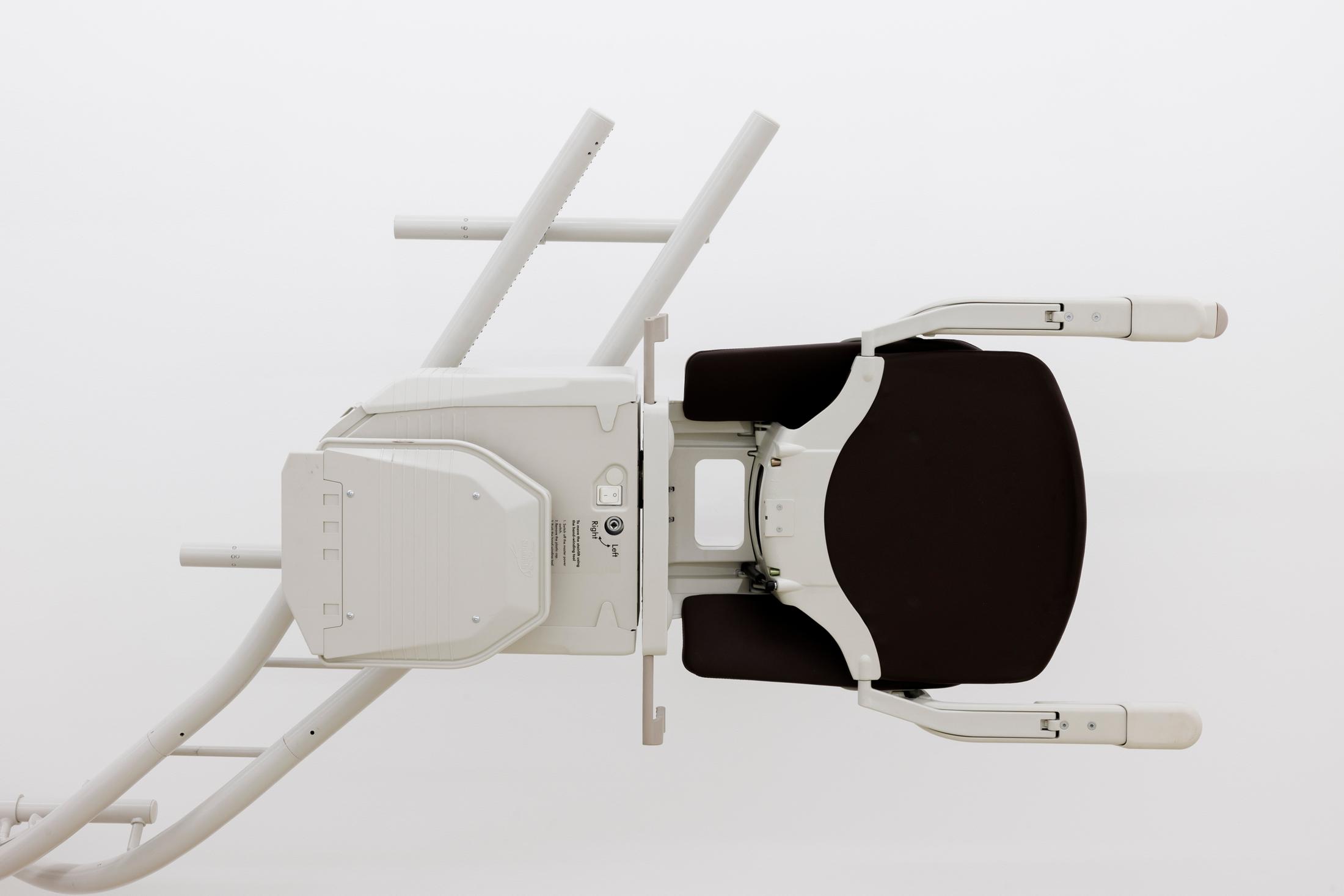 Exhibition View Group Show «Melting Point; view on Matthias Sohr, Treppenlift-Skulptur 6 (Detail), 2024, various materials, 370 x 102 x 110 cm» at For, Basel, 2024 / Photo: Gina Folly / Courtesy: the artists and For