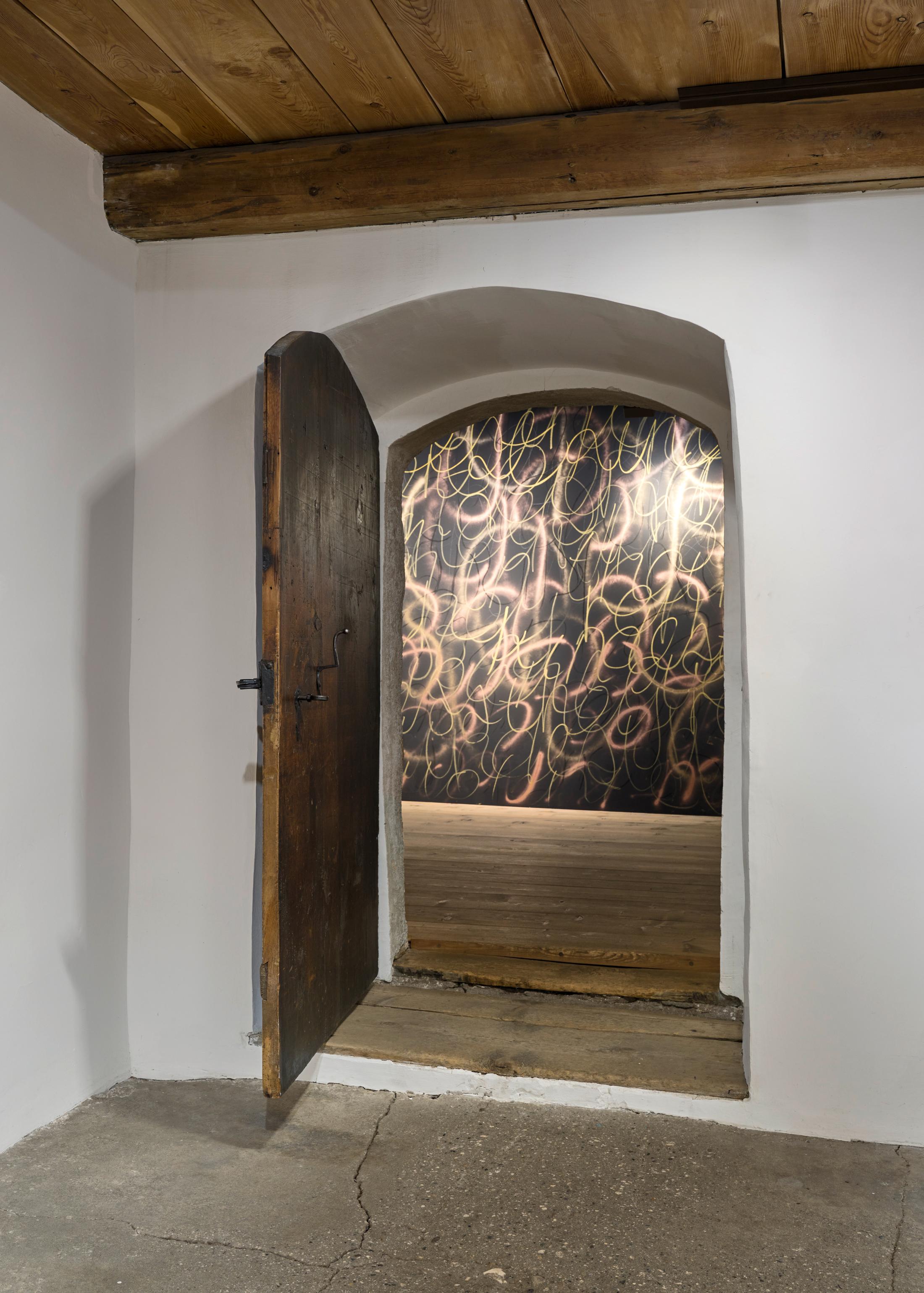 Exhibition View donna Kukama Solo Show «transcendence; view on donna Kukama, Even in their kindest-kindest kindness, they remain violent, 2023, acrylic, charcoal, soft pastel, spirit, liquid chalk, spray, paint, dimensions variable» at Galerie Tschudi, Zuoz, 2023 / Photo: Ralph Feiner / Courtesy: the artist and Galerie Tschudi