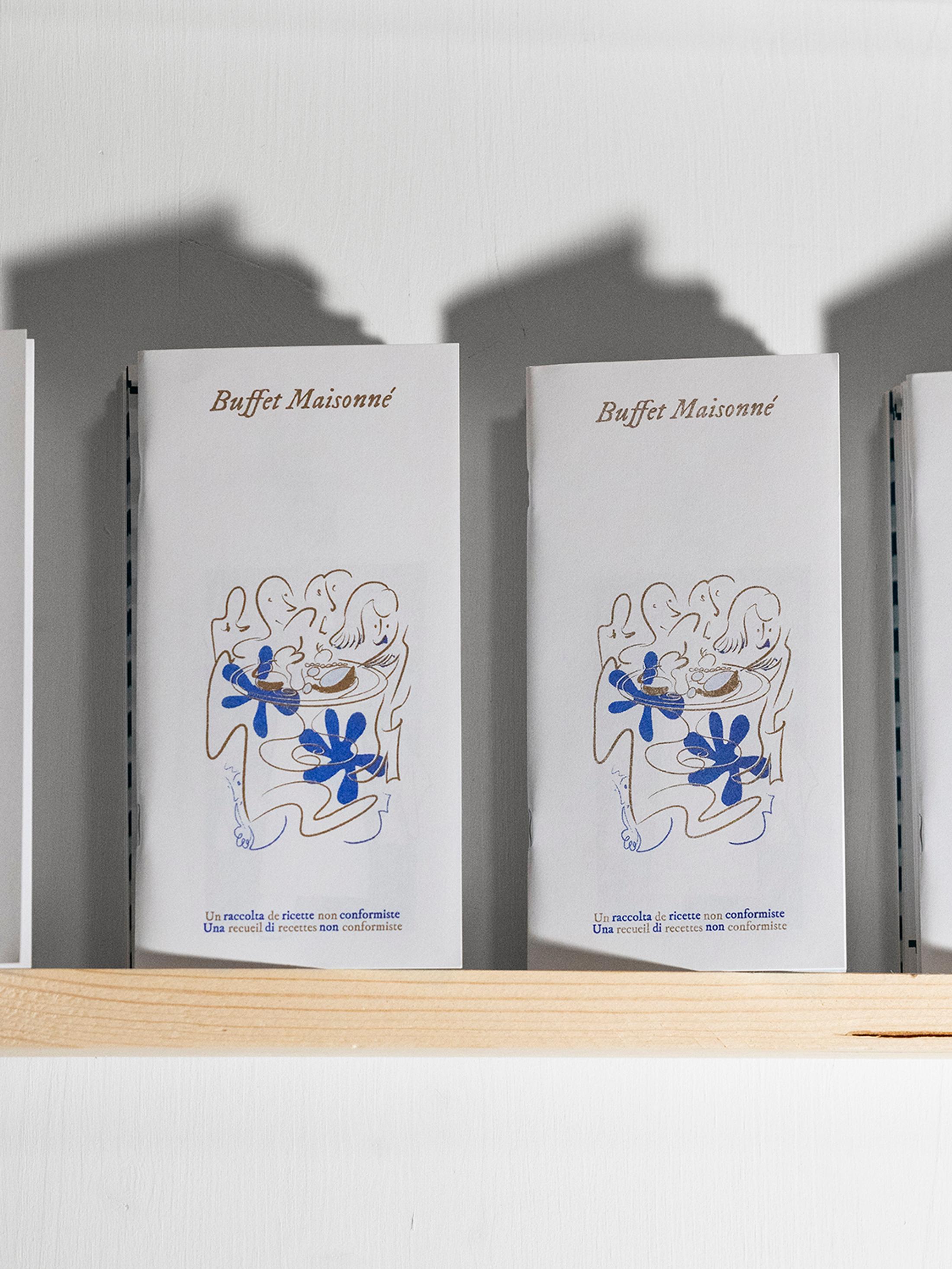 Exhibition View Group Show «Gulp; view on a Detail of the Publication Buffet Maisonné by Cassiane Pfund, Larissa Tiki Mbassi, Juliette Lépineau and Jessy Razafimandimby, RISO-printed edition of 120 copies, 2023» at La Rada, Locarno, 2023 / Photo: Riccardo Giancola / Courtesy: the artist and La Rada