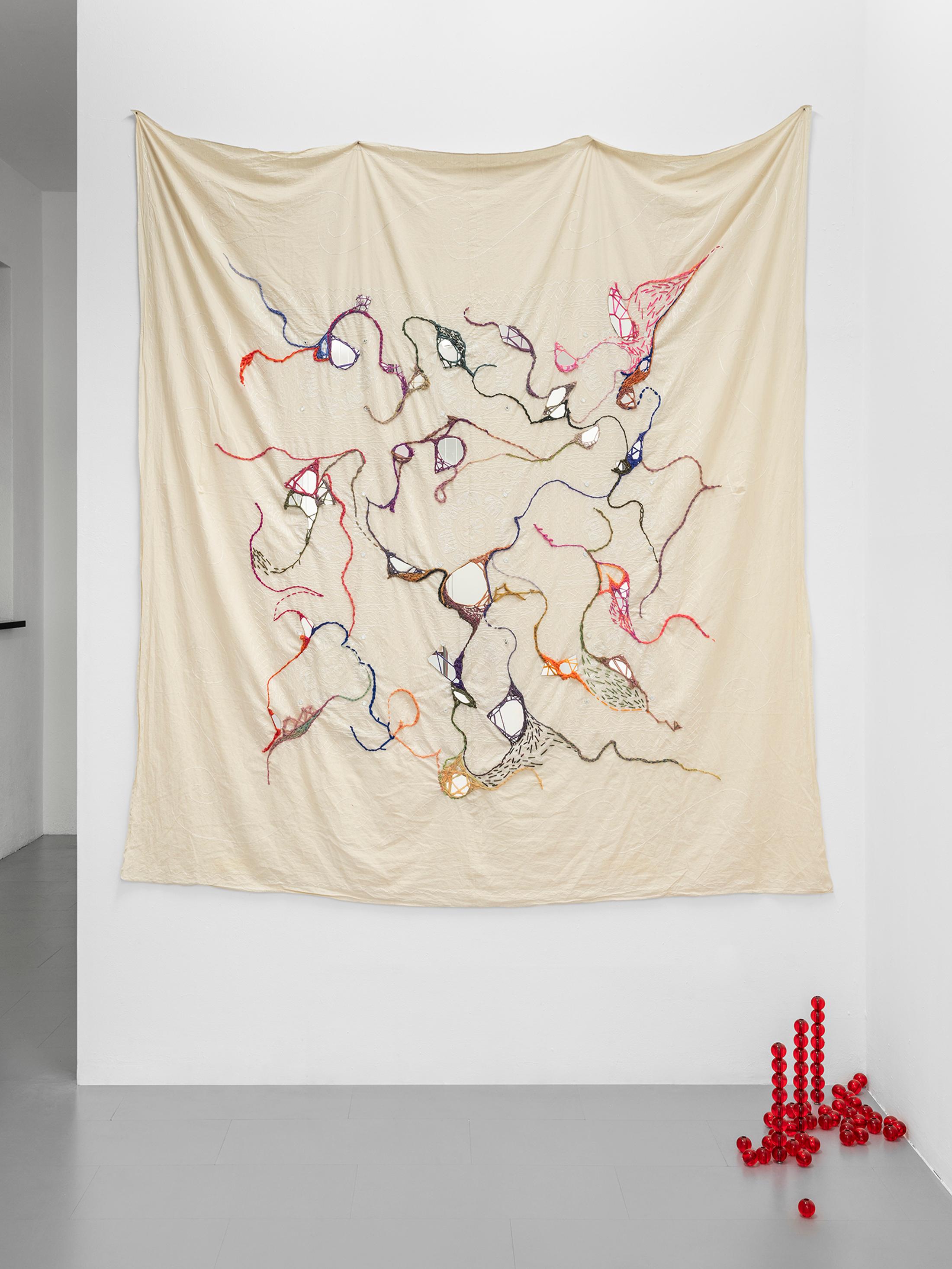 Exhibition View Group Show «Gulp; view on Zahrasadat Hakim, Les miroirs ne me contiennent pas, 2023, Embroidered cloth, mirror, 200 x 225 cm» at La Rada, Locarno, 2023 / Photo: Riccardo Giancola / Courtesy: the artist and La Rada