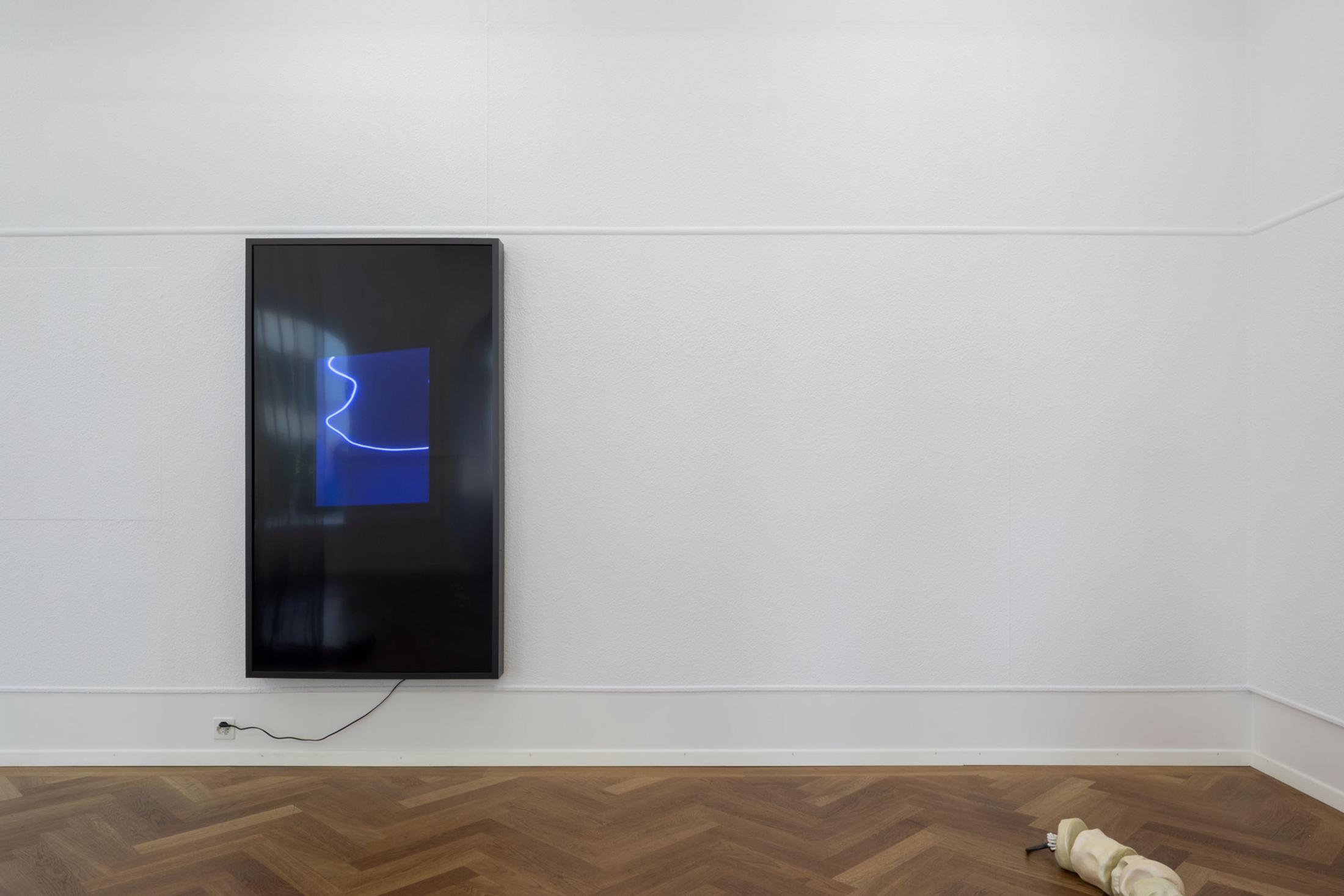 Exhibition View Leolie Greet with Amélie Bodenmann, Anina Müller and Nina Rieben Show «mumbles slide along the sleeve; view on Nina Rieben, Not yet titled, 2022, digital photography, screen, frame, 3 + 2AP» at Krone Couronne, Biel, 2023 / Photo: Guadalupe Ruiz / Courtesy: the artist and Krone Couronne