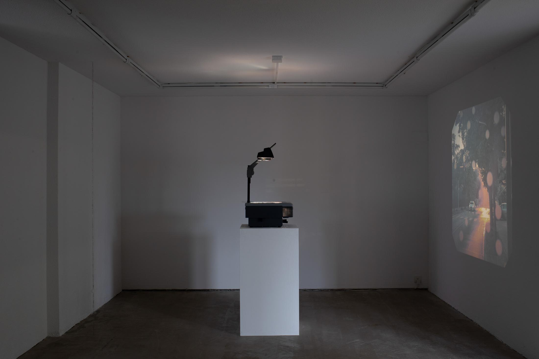 Exhibition View Group Show «Memory Mold; view on Medjid Sopi, Front Seat, 2024, Digital print on PVC (A3), overhead projector» at Hamlet, Zurich, 2024 / Photo: Leevi Toija / Courtesy: the artists and Hamlet