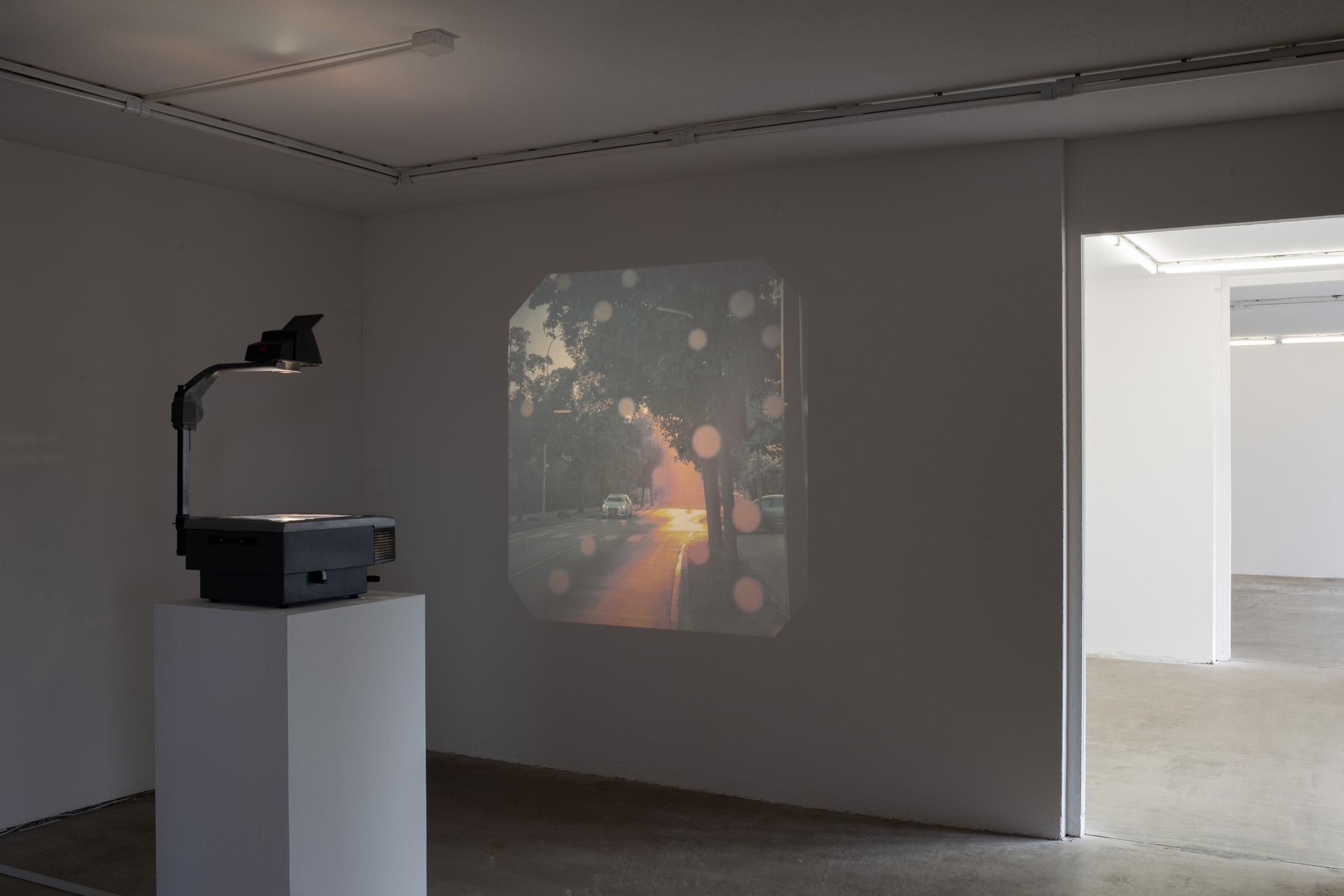 Exhibition View Group Show «Memory Mold; view on Medjid Sopi, Front Seat, 2024, Digital print on PVC (A3), overhead projector» at Hamlet, Zurich, 2024 / Photo: Leevi Toija / Courtesy: the artists and Hamlet
