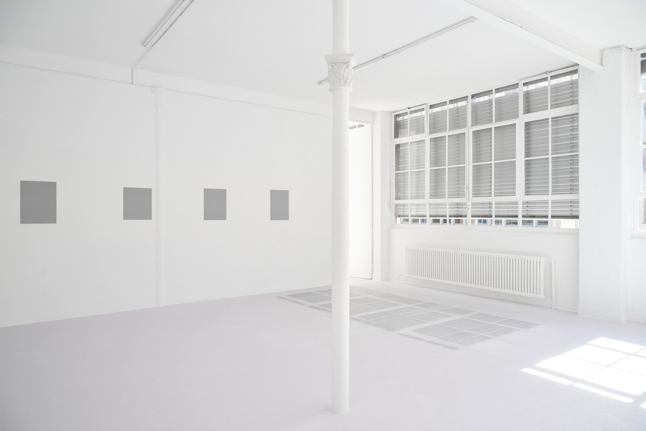 Exhibition View Solo Show Pauline Cordier «Holding Time; view on Pauline Cordier, 70, photochromic pigment, white paint, 70 m2, 2024» at andata ritorno - laboratoire d'art contemporain, Geneva, 2024 / Photo: Loïc Herin / Courtesy: The artist and andata ritorno - laboratoire d'art contemporain