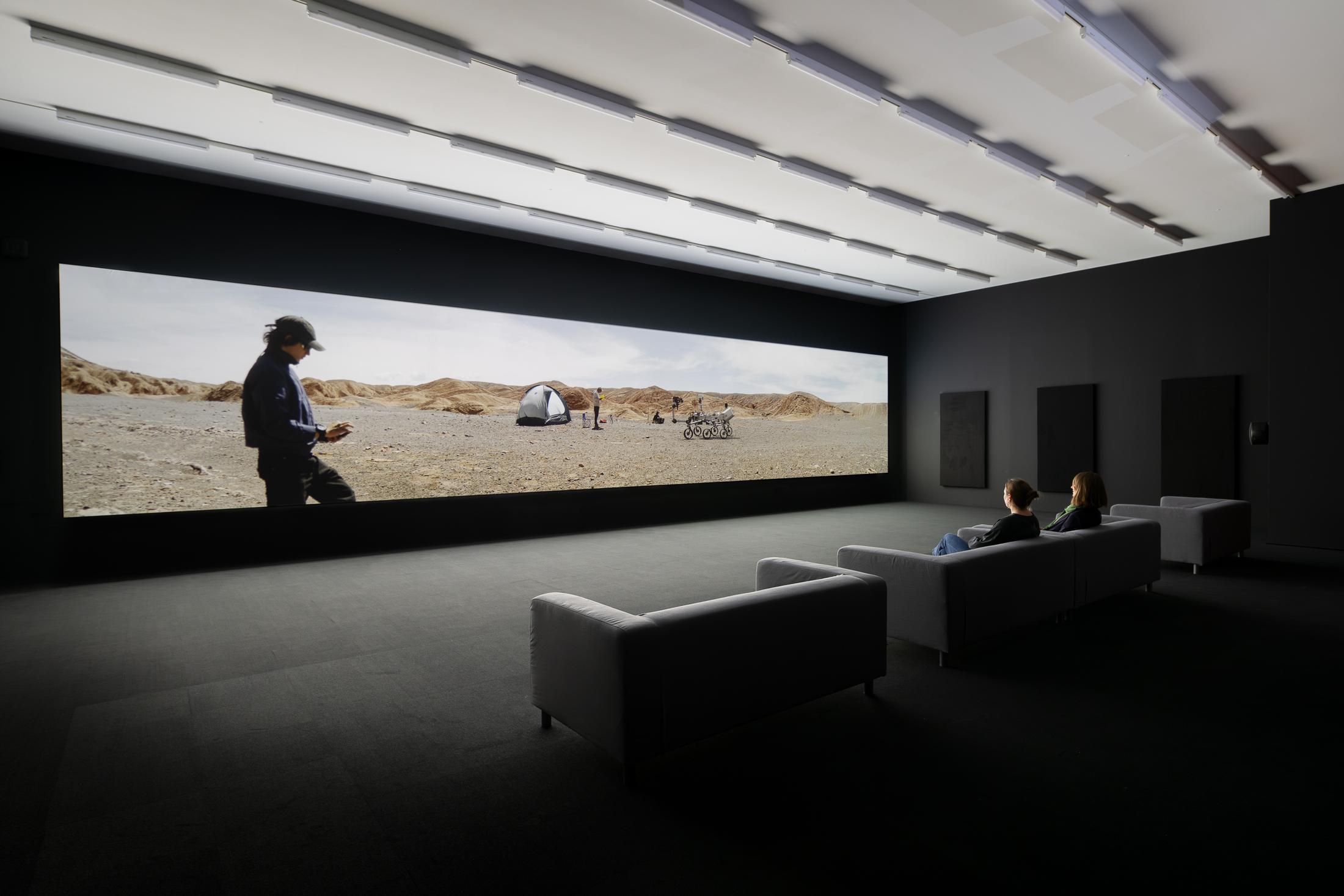 Exhibition View Solo Show Pauline Julier «A Single Universe; view on Pauline Julier and Clément Postec, Follow the Water, 2023, 3-Kanal-Video, 51'» at Aargauer Kunsthaus, Aarau, 2024 / Photo: ullmann.photography / Courtesy: The artist and Aargauer Kunsthaus