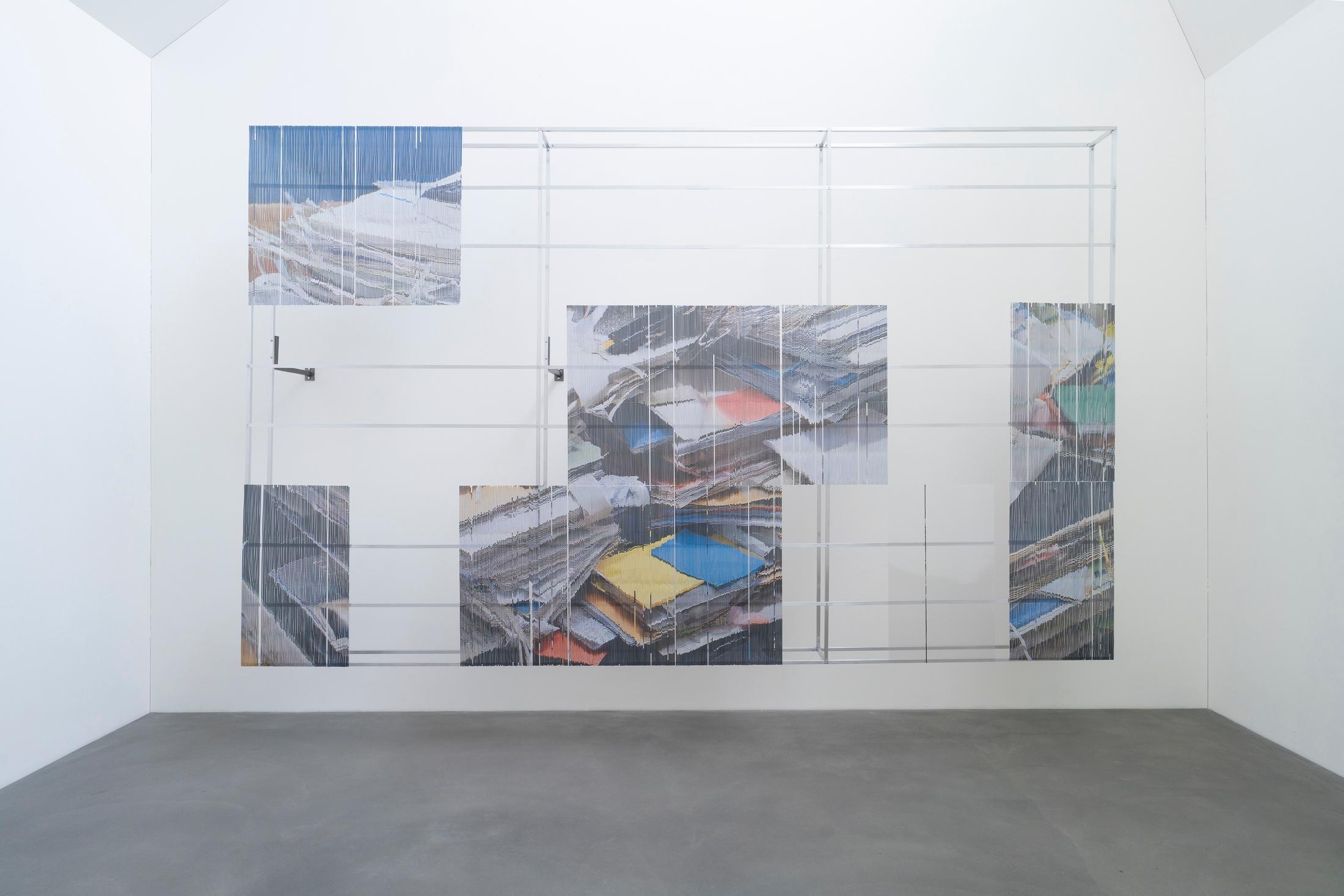 Exhibition View Group Show «Plattform24; view on Yul Tomatala, Hoarding, 2024, Extruded aluminium profiles and cast aluminium connectors, polycarbonate panels, laser prints on paper, steel brackets, tarpaulin, 488 x 304 x 34 cm» at Kunstmuseum Kunsthalle Appenzell, Appenzell, 2024 / Photo: Claude Barrault / Courtesy: The artists and Kunstmuseum Kunsthalle Appenzell