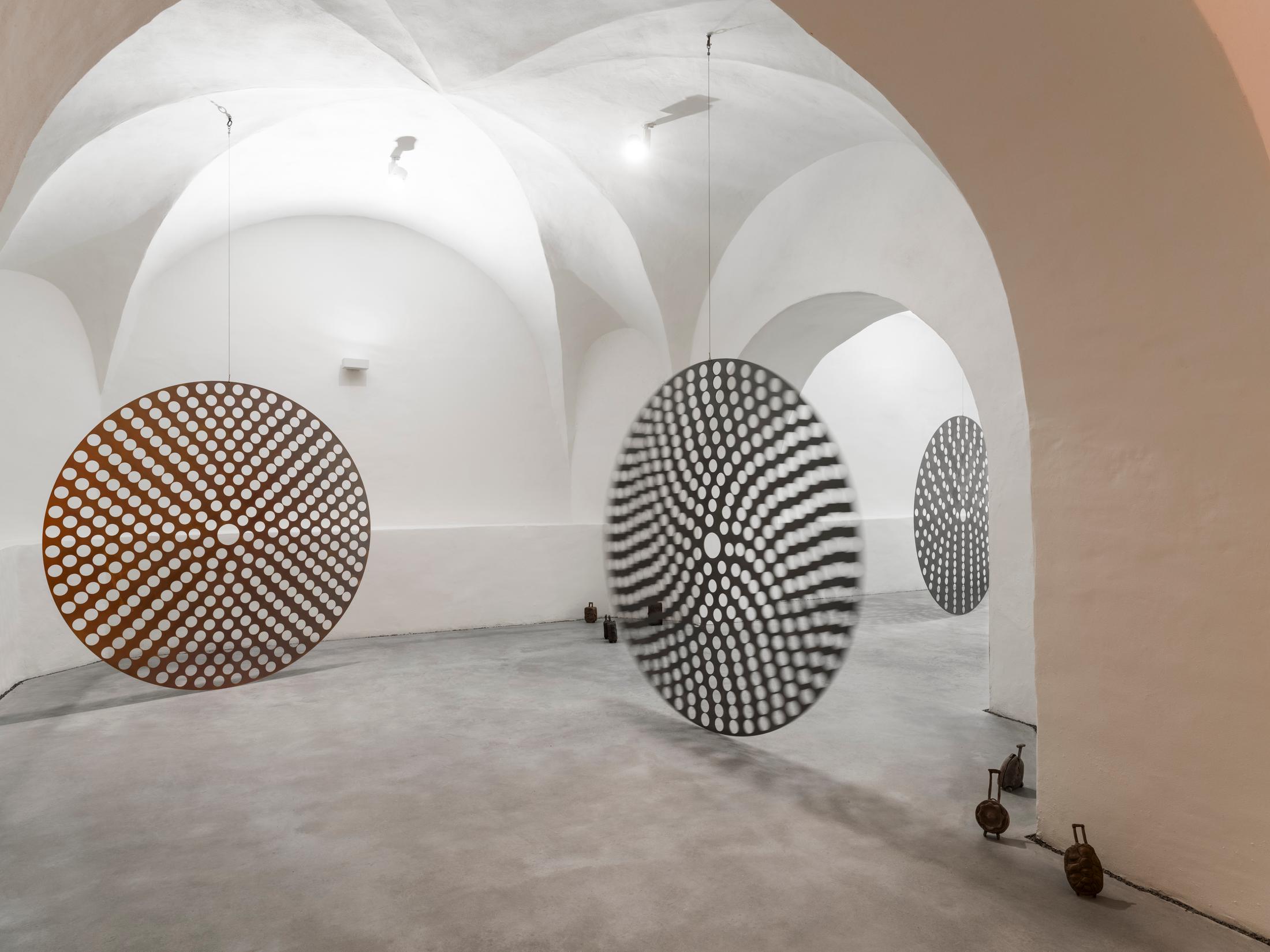 Exhibition View Solo Show Raphael Stucky «Troposonic; view on Anti-Volumen, Clay sculptures, 2024 & Siren Disc, Perforated Steel Disk, 2024» at Musée d’art du Valais / Kunstmuseum Wallis, Sion, 2025 / Photo: Olivier Lovey / Courtesy: the artist and Musées cantonaux du Valais