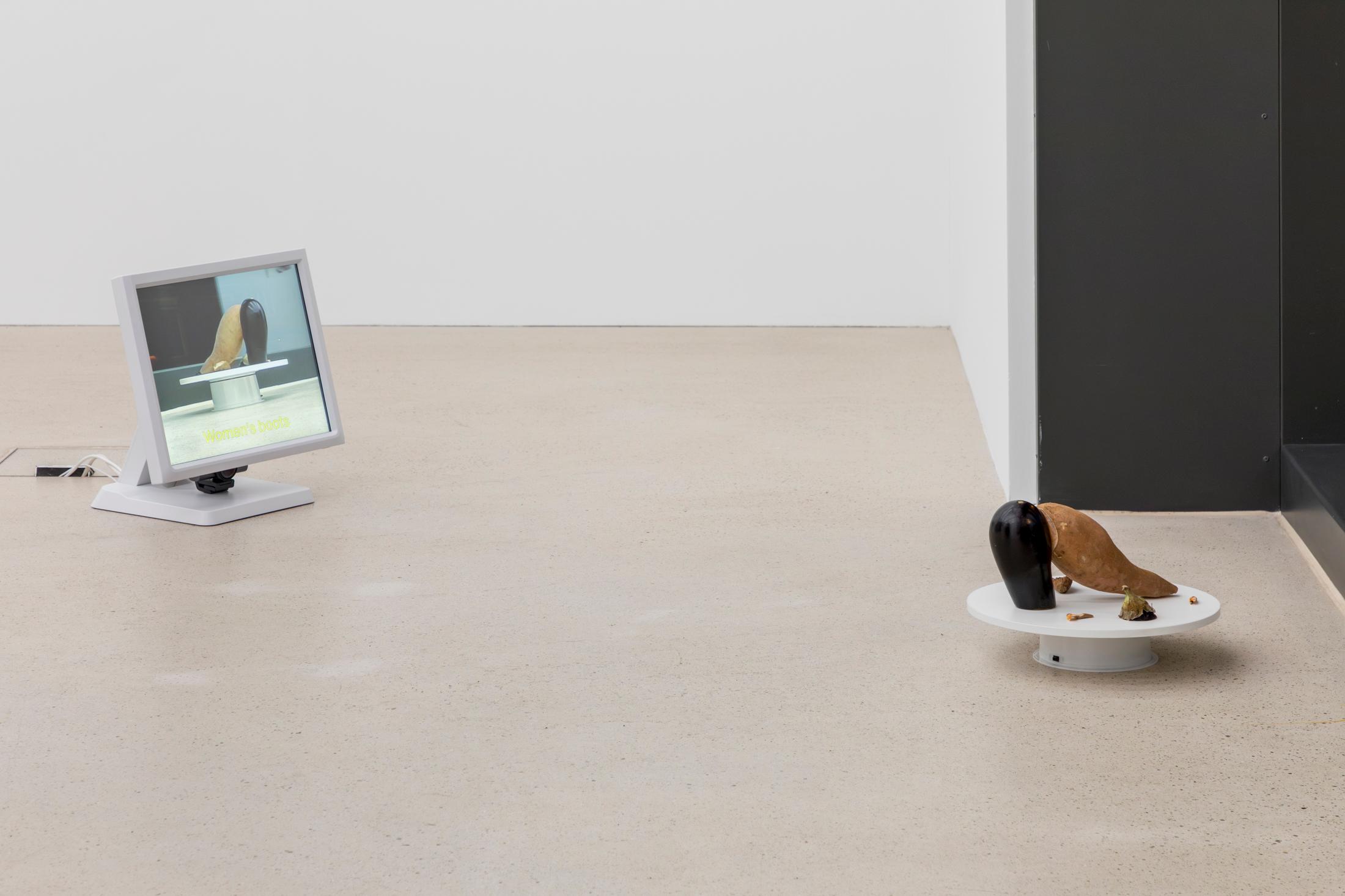 Exhibition View Group Show «Seriously, yes; view on Alfatih, Untitled, 2019, Food sculpture, rotating platform, screen, webcam, Raspberry PI connected to the internet via WIFI, dimensions variable» at Windhager von Kaenel, Zug, Switzerland 2024 / Photo: Oliver Kümmerli