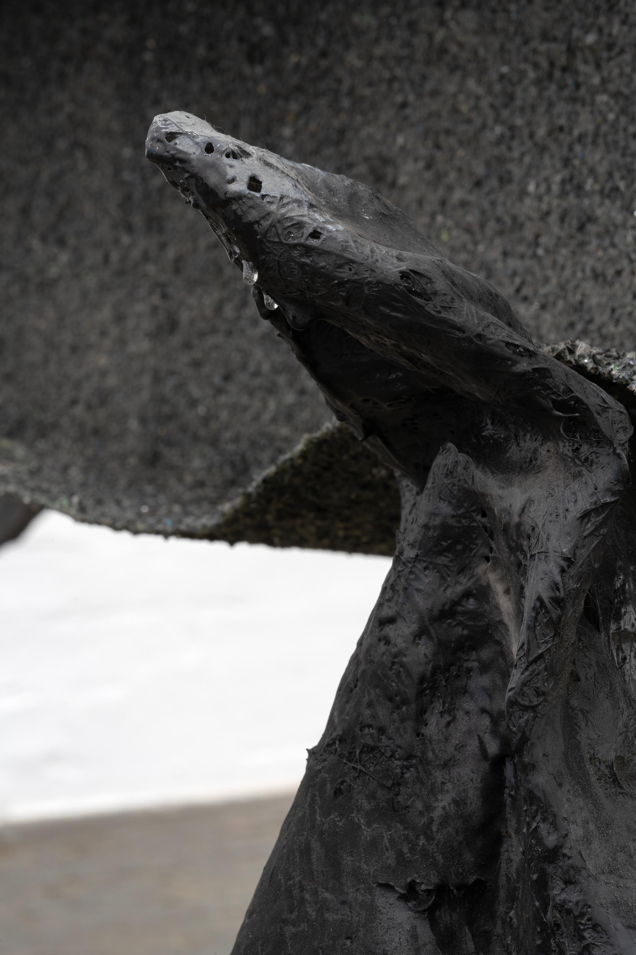 Exhibition View Double Show Sofía Salazar Rosales «Imagínate vivir en Suiza y perderte esto ; view on When the axial skeleton decides to speak & We are contextual and sentimental (Detail), 2025, Glass agreggate, charcoal, iron powder, plaster, vinyl glue, fiberglass, polyester resin, epoxy, 100 x 306 x 95cm» at Kunst Halle Sankt Gallen, St. Gallen, 2025 / Photo: E. Sommer / Courtesy: the artist and ChertLüdde, Berlin