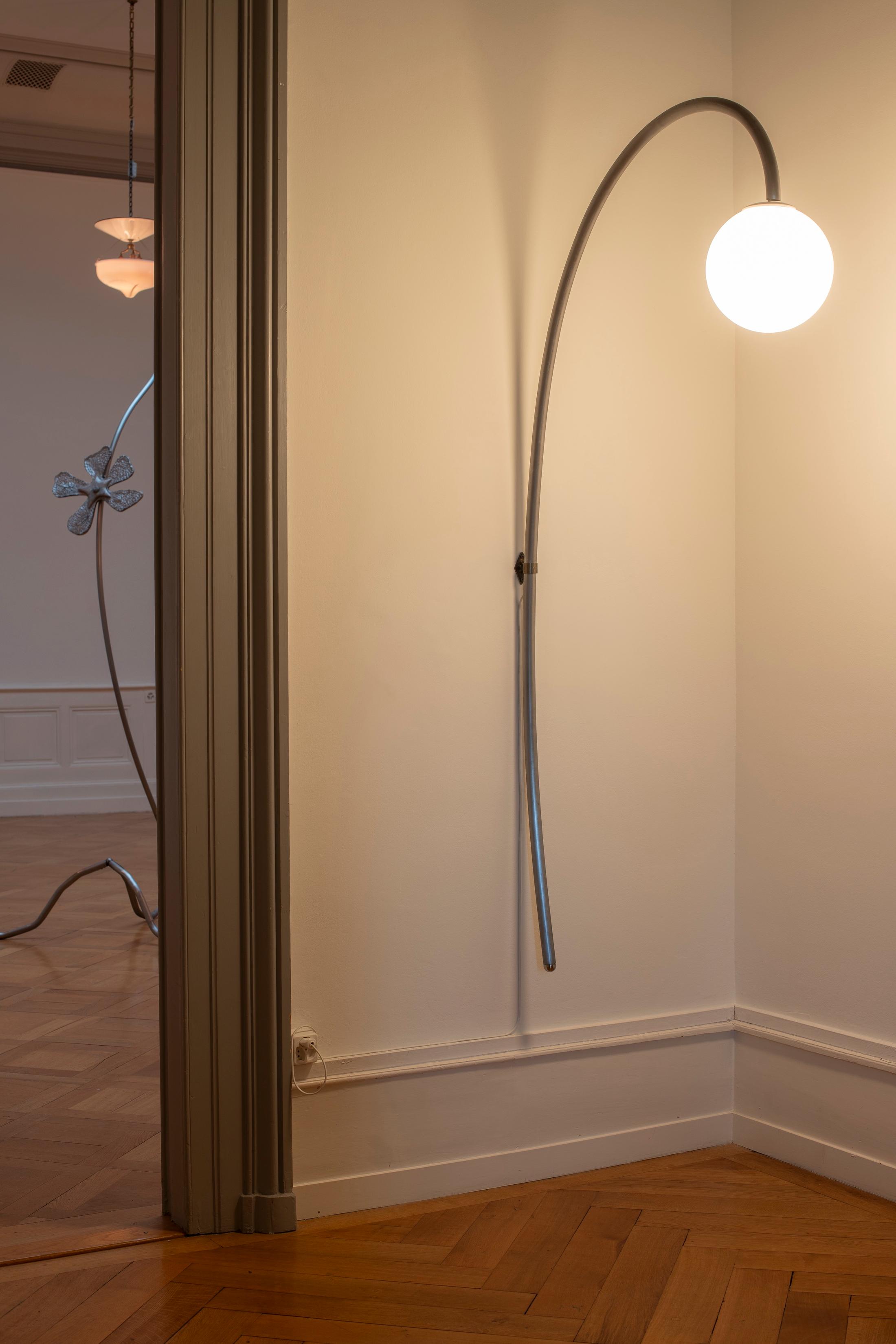 Exhibition View Solo Show Sophie Conus «Little ways down the road ; view on Street lamp, 2024, plastic, light system, steel» at Salle Crosnier, Palais de l'Athénée, Geneva, 2024 / Photo: Guillaume Python / Courtesy: the artist and Palais de l'Athénée