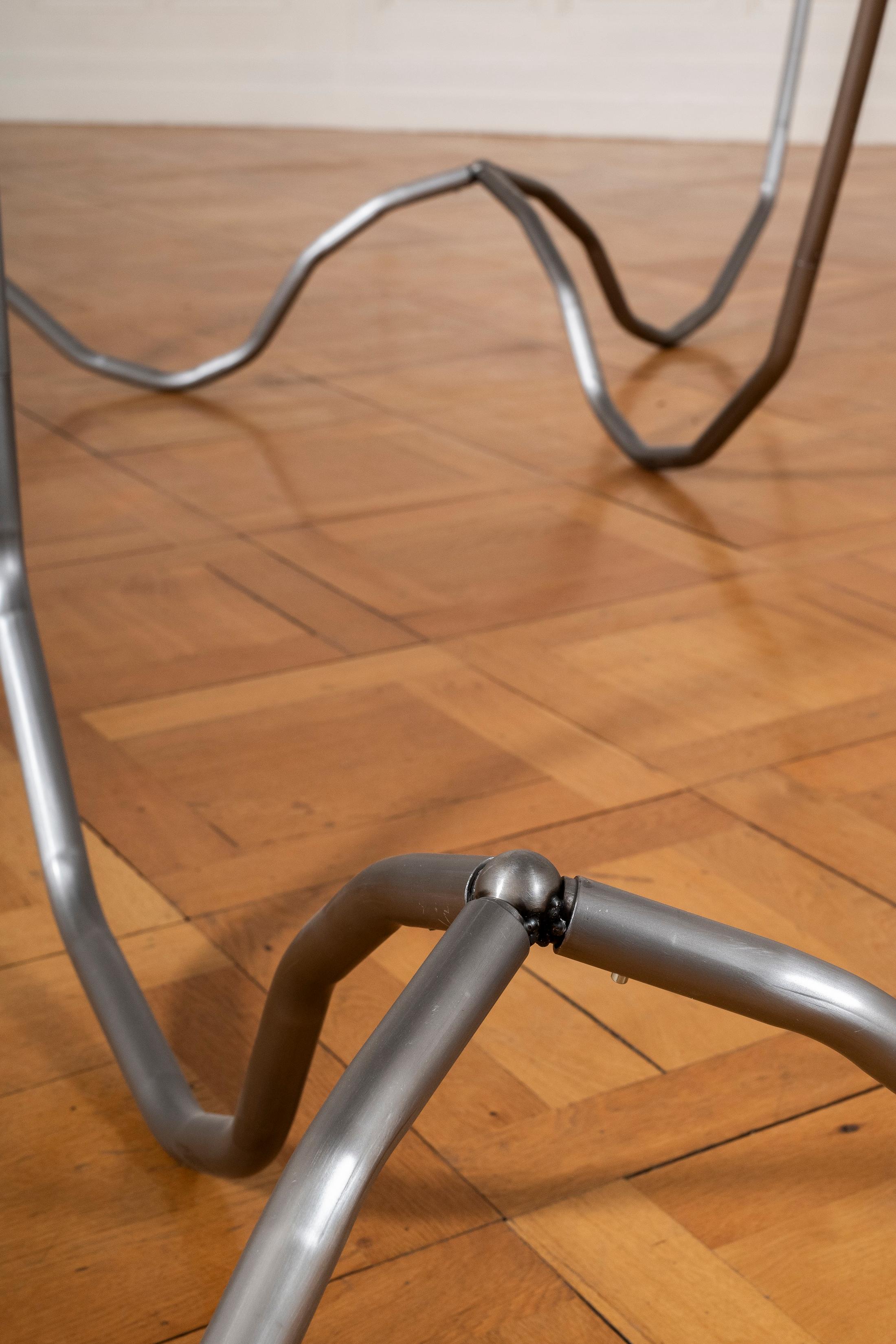 Exhibition Text Solo Show Sophie Conus «Little ways down the road ; view on Bad Weeds (Detail), 2024, steel, aluminum» at Salle Crosnier, Palais de l'Athénée, Geneva, 2024 / Photo: Guillaume Python / Courtesy: the artist and Palais de l'Athénée