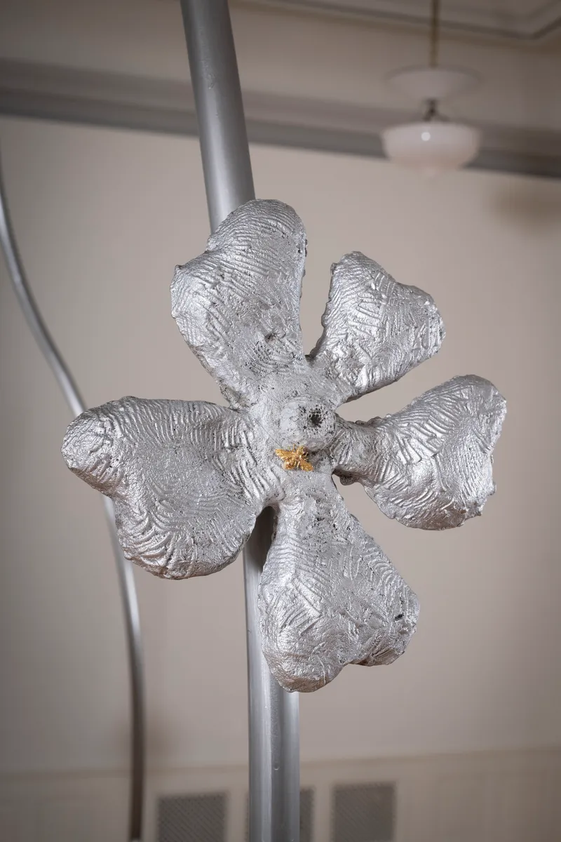 Exhibition Text Solo Show Sophie Conus «Little ways down the road ; view on Bad Weeds (Detail), 2024, steel, aluminum, and Gold bees, 1960, Society of the Arts archives» at Salle Crosnier, Palais de l'Athénée, Geneva, 2024 / Photo: Guillaume Python / Courtesy: the artist, Palais de l'Athénée and Society of the Arts archives