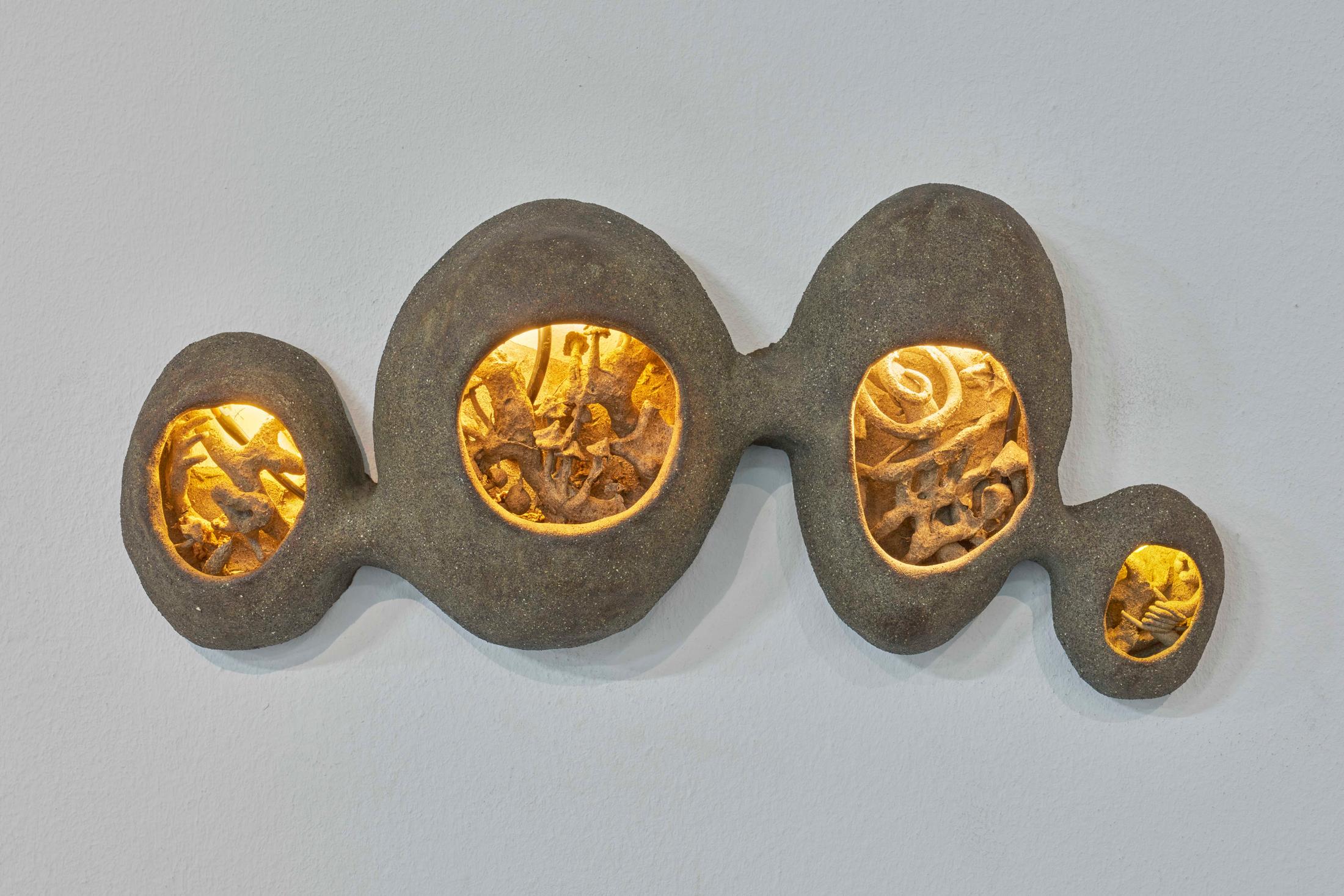 Exhibition View Solo Show Sophie Conus «Little ways down the road ; view on Attrape~Cœurs (Heart Catchers), 2024, ceramics, light system» at Salle Crosnier, Palais de l'Athénée, Geneva, 2024 / Photo: Guillaume Python / Courtesy: the artist and Palais de l'Athénée