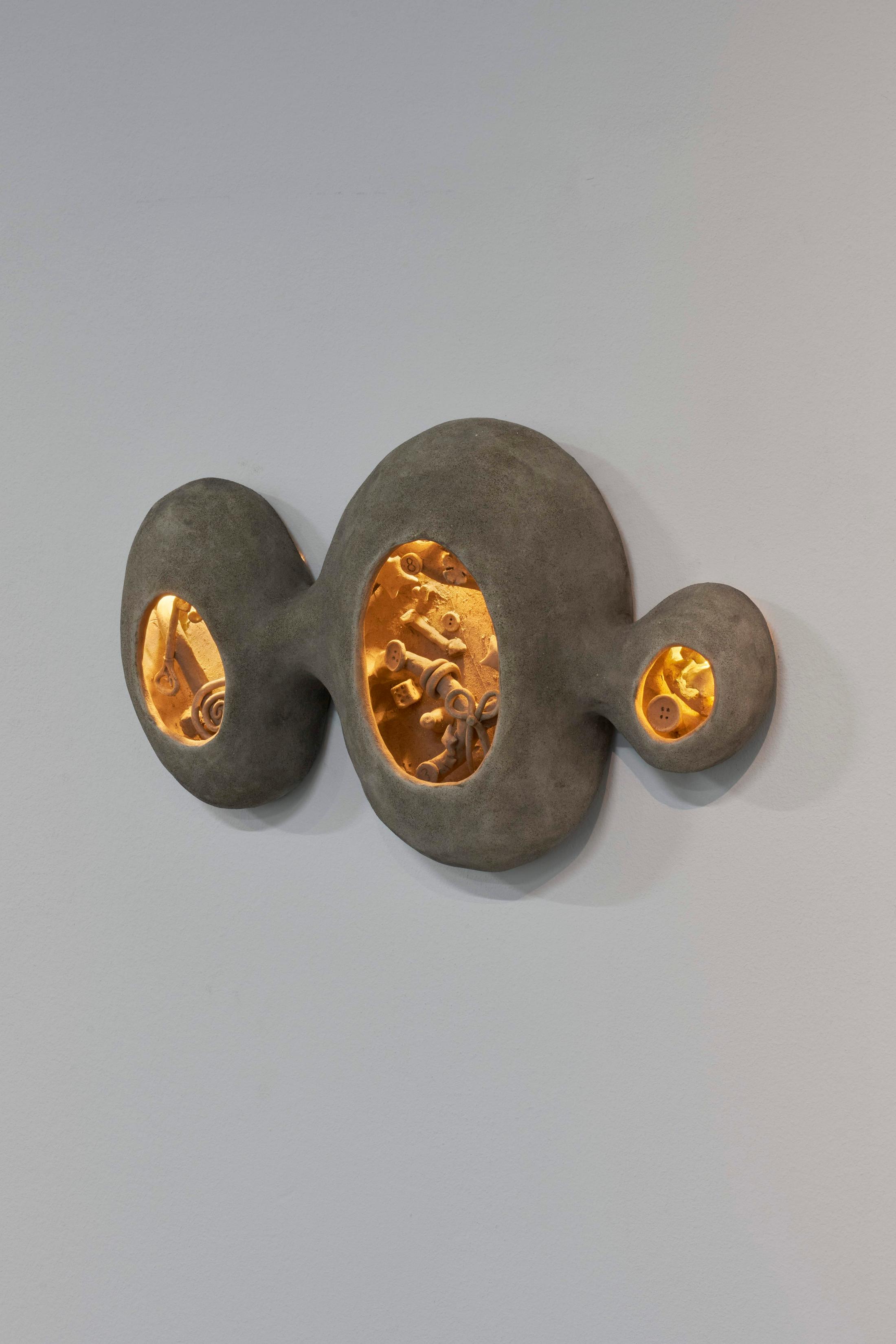 Exhibition View Solo Show Sophie Conus «Little ways down the road ; view on Attrape~Cœurs (Heart Catchers), 2024, ceramics, light system» at Salle Crosnier, Palais de l'Athénée, Geneva, 2024 / Photo: Guillaume Python / Courtesy: the artist and Palais de l'Athénée