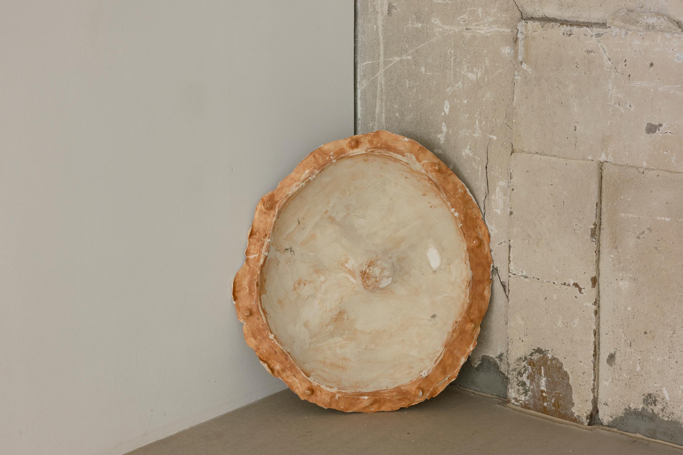 Exhibition View Yasmine El Meleegy Solo Show «The six hundred seventy-four forms and a dragon; view on Yasmine El Meleegy, he six hundred seventy-four forms and a dragon, 2023, InkJet print on transparent film, dia-projector, vegetable boxes, food grade safe pp leno bags, cushions, 80 slides, loop, installation dimensions variable» at For Space, Basel, 2023 / Photo: Gina Folly / Courtesy: the artist and For Space