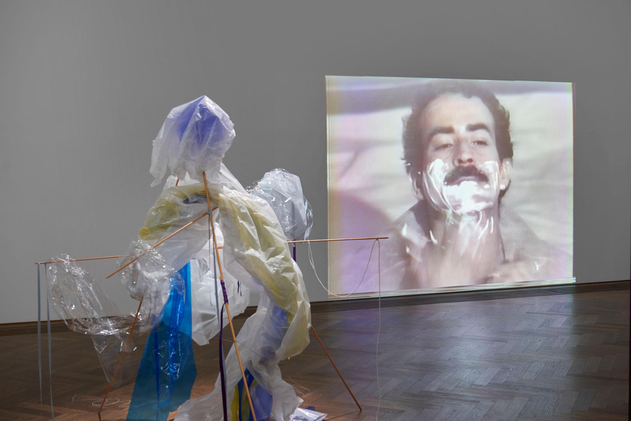 Exhibition View Groupshow «Bizarre Silks, Private Imaginings and Narrative Facts, etc.; view on Nick Mauss, Tresholds, 2020, und (hinten) Rosemary Mayer, «Wiederaufführung» von Nick Mauss in Zusammenarbeit mit dem Estate of Rosemary Mayer, February Ghosts (Monoceros, Auriga, and Orion), 1981/2020 and Anton Perich, Victor Hugo Rojas, 1978 (video on the right)» an exhibition by Nick Mauss at Kunsthalle Basel, Basel, 2020 / Photo: Philipp Hänger and Kunsthalle Basel / Courtesy: the artists and Kunsthalle Basel