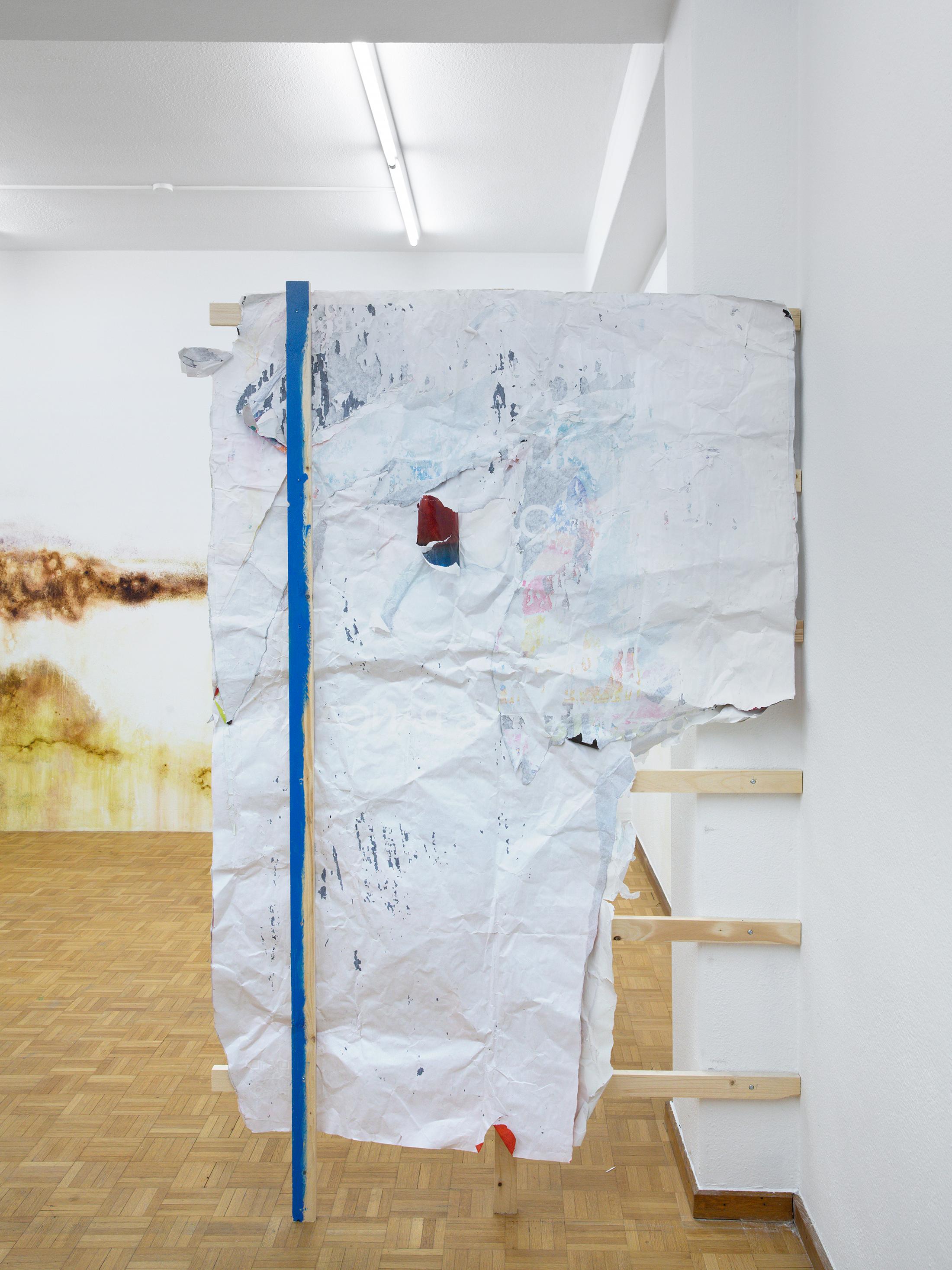 Exhibition View Duo Show «Wet Excess; view on Amina Ross, Hold (6), 2022, Found paper advertisements, wheat paste, rainwater, screws, wood, acrylic latex paint, 200 x 120 x 10cm» at Sentiment, Zurich, 2022 / Photo: Philipp Rupp and Julien Gremaud / Courtesy: the artist and Sentiment
