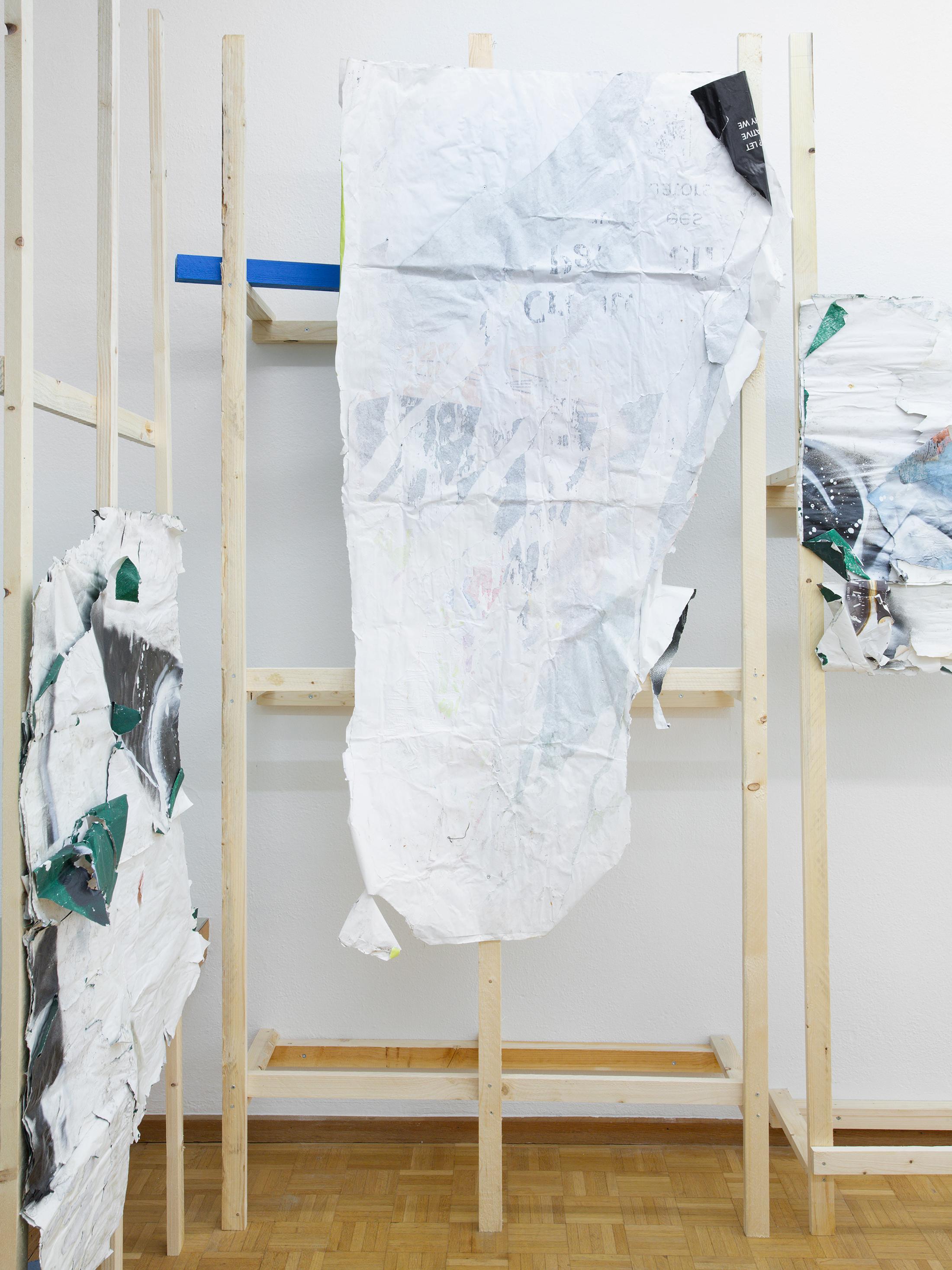 Exhibition View Duo Show «Wet Excess; view on Amina Ross, Hold (4), 2022, Found paper advertisements, wheat paste, rainwater, screws, wood, acrylic latex paint, 250 x 110 x 40cm» at Sentiment, Zurich, 2022 / Photo: Philipp Rupp and Julien Gremaud / Courtesy: the artist and Sentiment