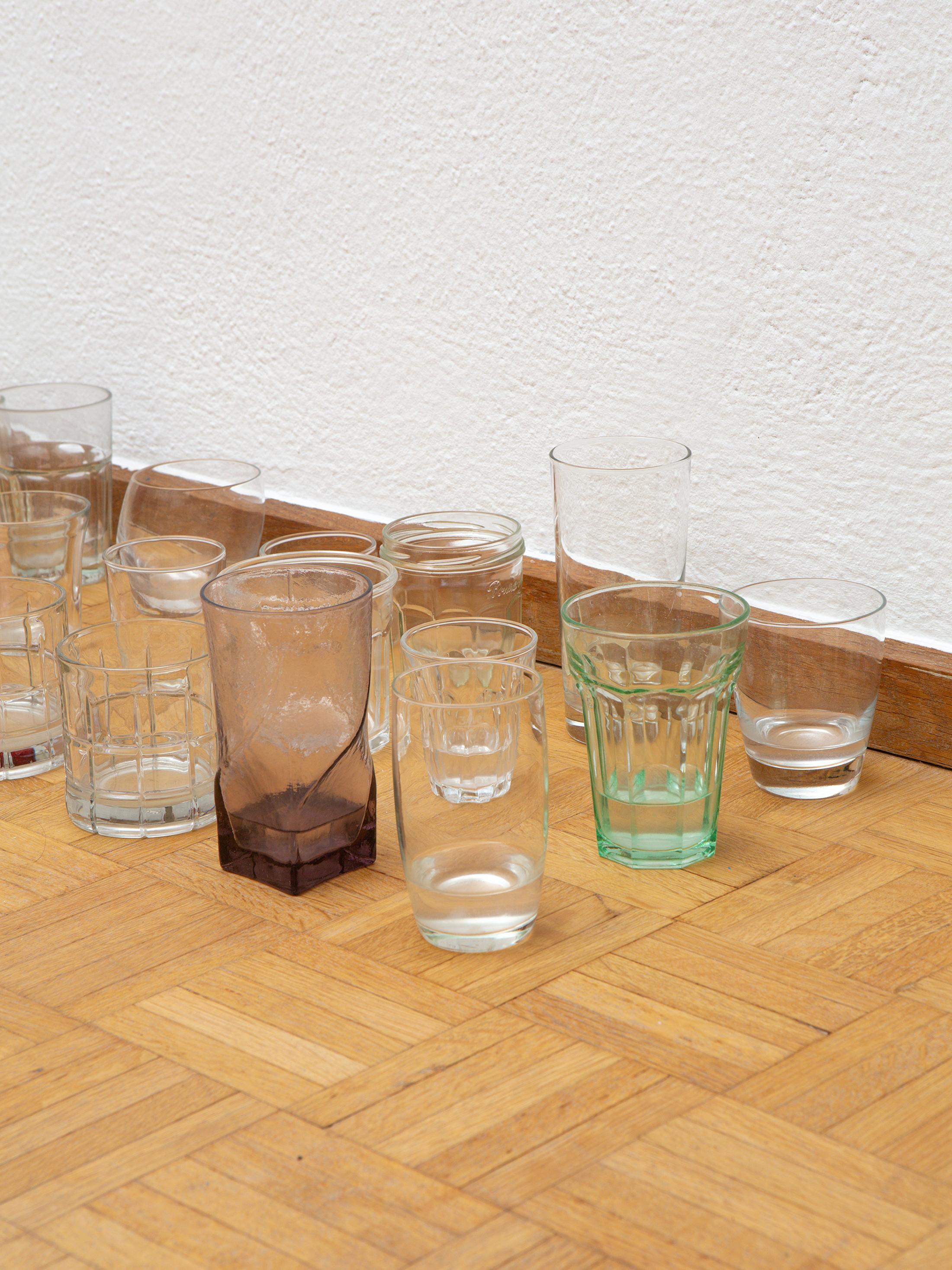 Exhibition View Duo Show «Wet Excess; view on Amina Ross, Untitled, 2020 - ongoing, Glassware, NYC rainwater (upon evaporation, the NYC rainwater is replaced with the one from Zurich)» at Sentiment, Zurich, 2022 / Photo: Philipp Rupp and Julien Gremaud / Courtesy: the artist and Sentiment