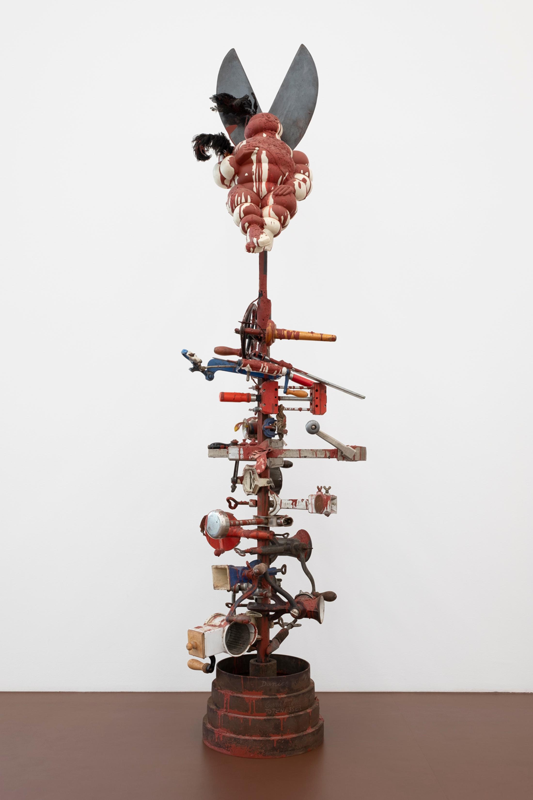 Exhibition View Daniel Spoerri «Solo Show; view on Daniel Spoerri, Canibalen Totenesser Totempfahl mit Michelin Männchen, 1986» at Karma International, Zurich, 2022 / Photo: Isabel Rotzler / Courtesy: the artist and Karma International