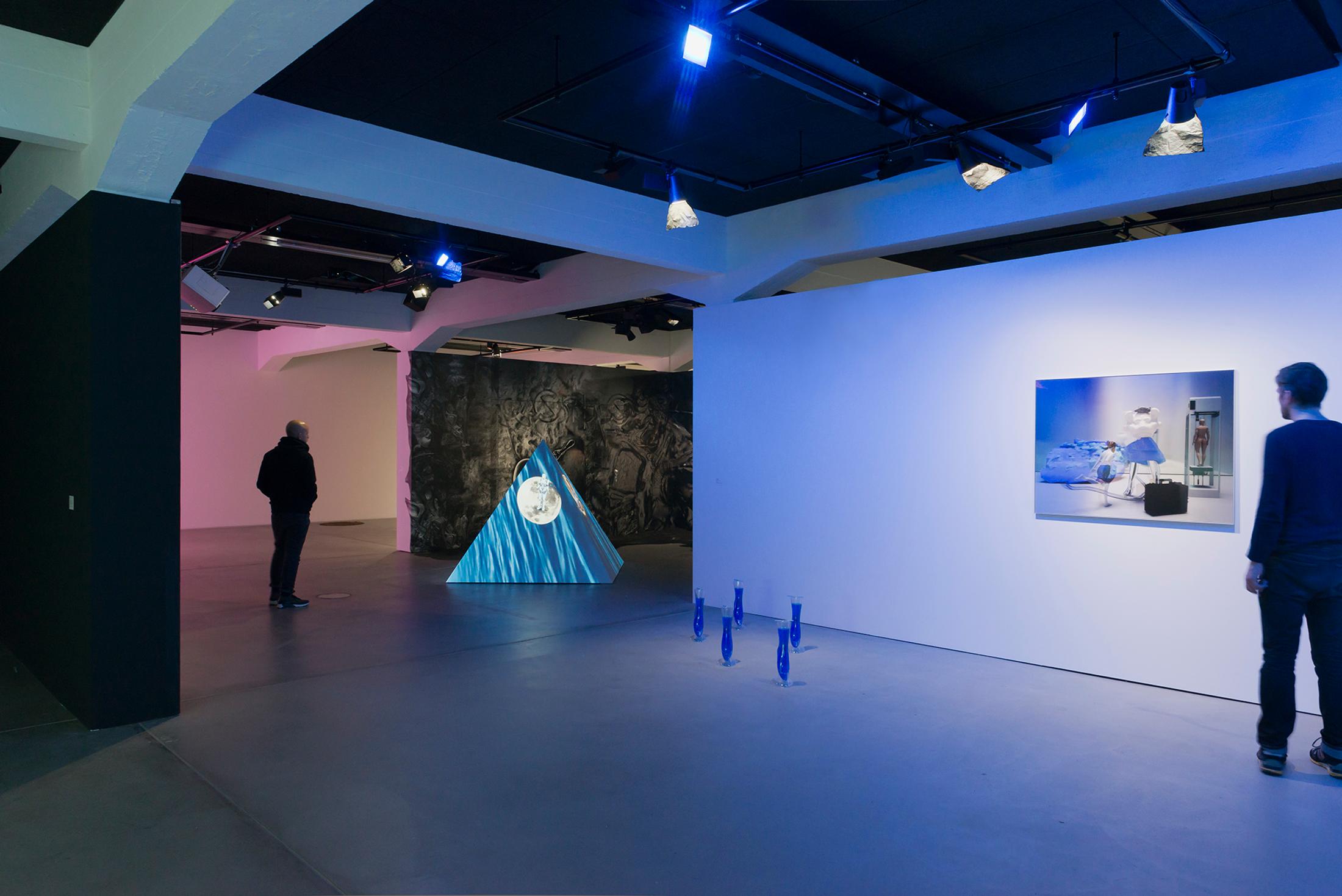 Installation View Olga Fedorova "Evil Eyes, 2017" (right), Tabita Rezaire "Ultra Wet – Rec­apitulation, 2018" (background) at HEK, Basel / Photo: Franz Wamhof / Courtesy: the artists