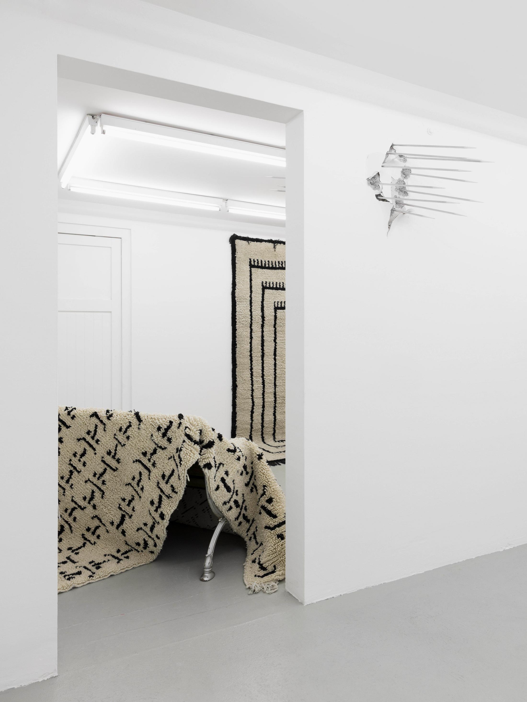 Exhibition View Groupshow «Hunter Of Worlds / view on Josep Maynou, Happy and Sad; 5 Carpets (both 2018), detail; Marie Matusz, Self-fulfilling Prophecy (2018), detail» at SALTS, Birsfelden / Photo: Gunnar Meier / Courtesy: the artist and SALTS