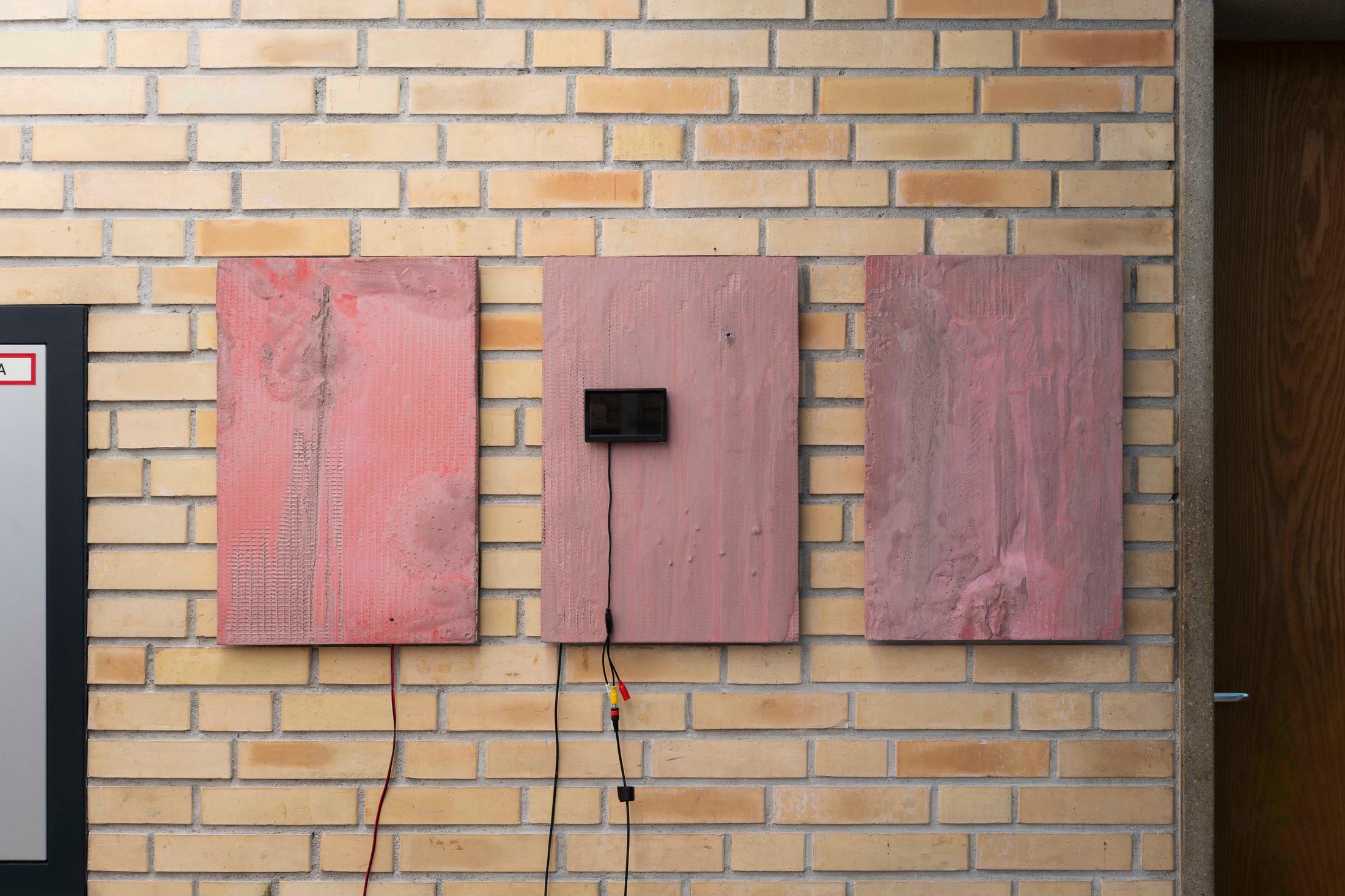 Exhibition View Group Show «Im Volksgarten; view on Julia Scher, Delta, 2020, concrete mix coated insulation boards, camera, LED, cables, 3 parts each 60 x 40 cm» at Kunsthaus Glarus, Glarus, 2020 / Photo: Gunnar Meier / Courtesy: the artist and DREI, Cologne / Esther Schipper, Berlin