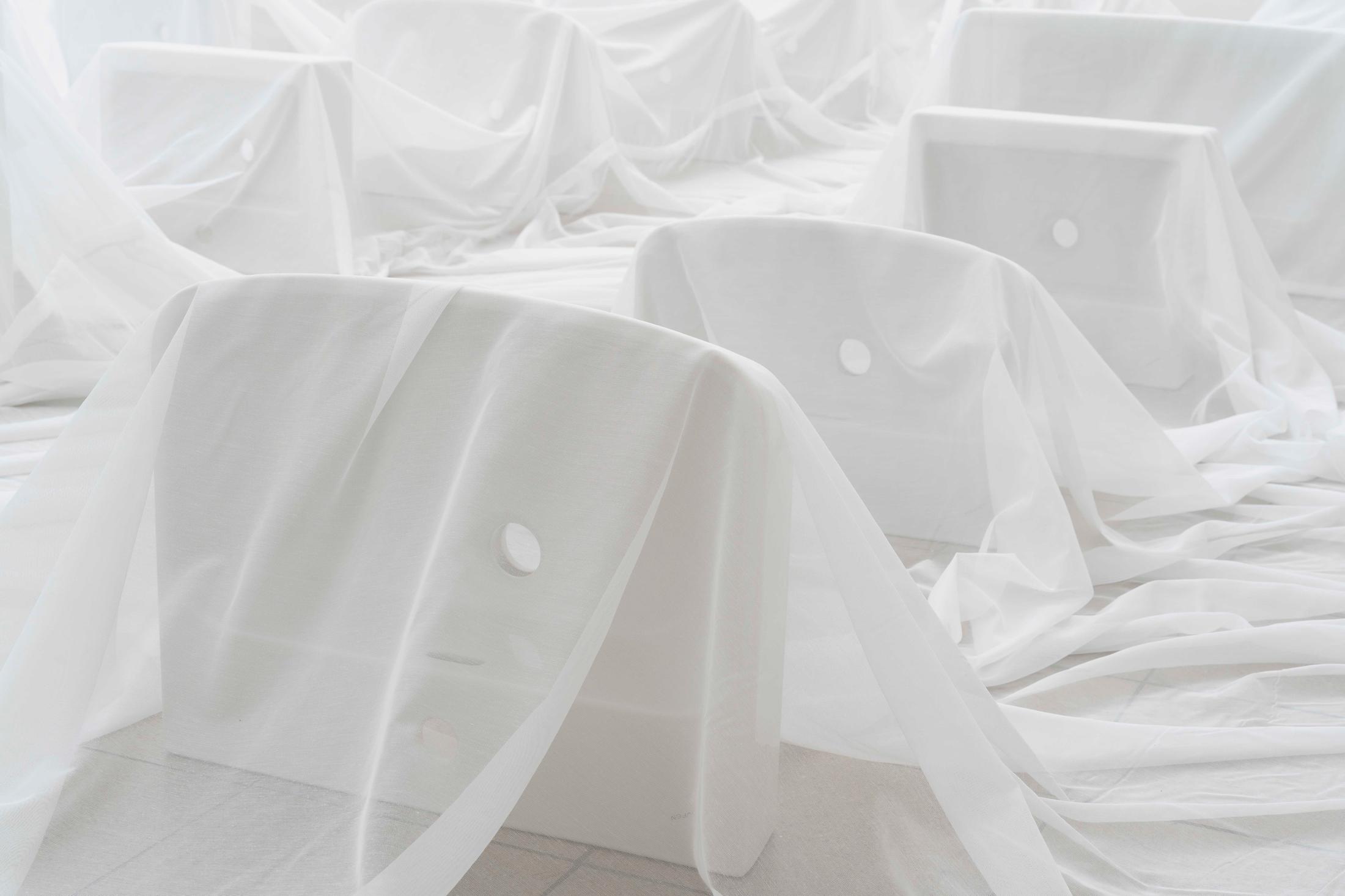 Exhibition View Group Show «Im Volksgarten; view on Olivia Ali ‡Tobias Kaspar, 50 reasons, 2020, (detail), from coreOATK or Stop Reading my Art as the Story of my Life, 2020, 50 sanitary facilities (ceramics), white fabric, 900 x 800 x 60 cm» at Kunsthaus Glarus, Glarus, 2020 / Photo: Gunnar Meier / Courtesy: the artist and Gallery Peter Kilchmann, Zurich
