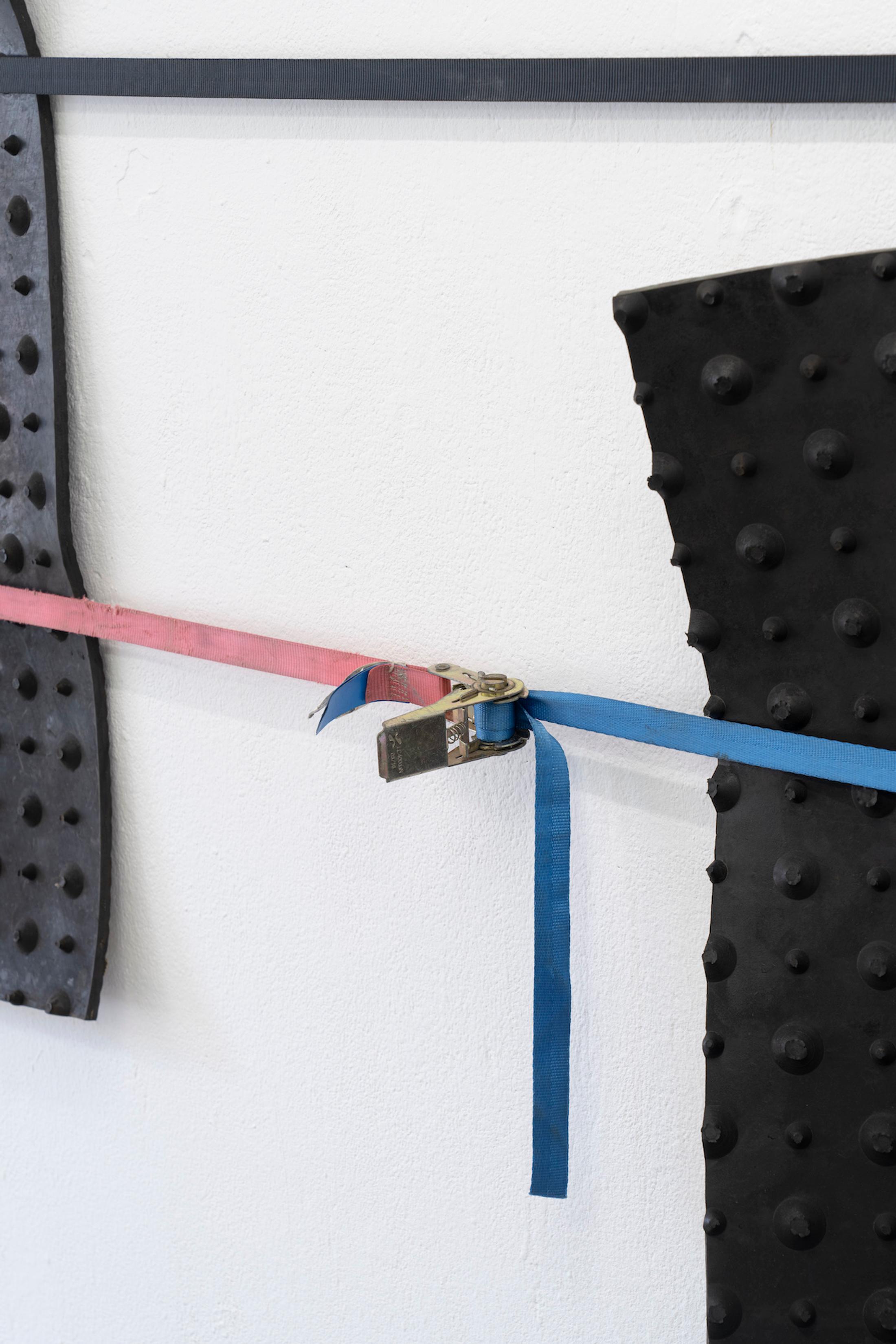 Exhibition View Group Show «Issue de secours; view on Val Minnig, Rubber coat, 2017, Kälber Neugummi Rollmatte schwarz mit Noppen, SpanSet» at Binz39, Zürich, 2021 / Photo: Claude Barrault / Courtesy: the artists and Binz39