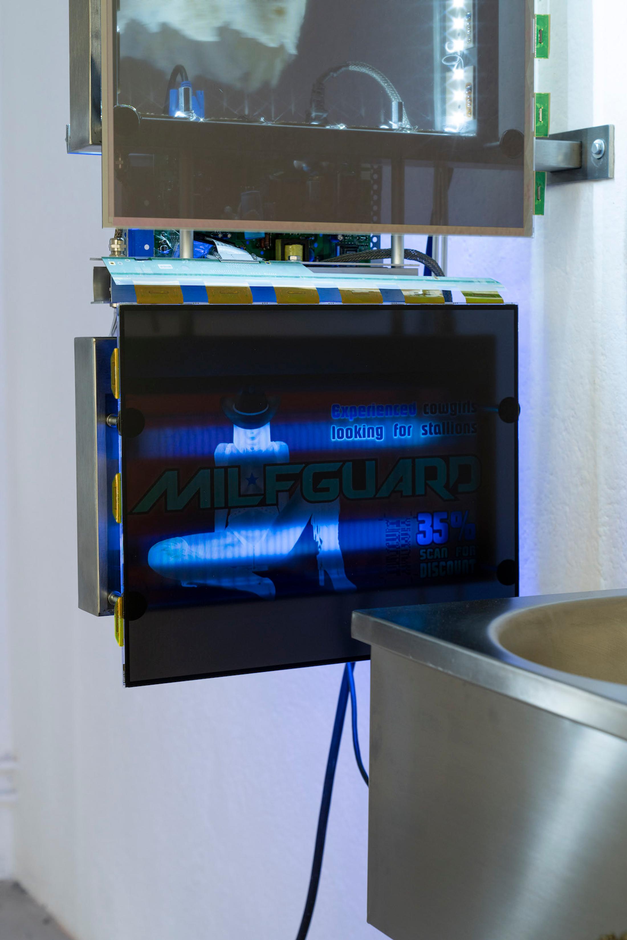 Exhibition View Group Show «Issue de secours; view on Chloé Delarue, TAFAA - FERTILITY DEVICE (NUDGE FOR THE SCAPEGOAT), 2021, Stainless steel, Neon, Polyurethan foam, Motor, Latex, Cigarettes, LCD screen, Led, Video» at Binz39, Zürich, 2021 / Photo: Claude Barrault / Courtesy: the artists and Binz39