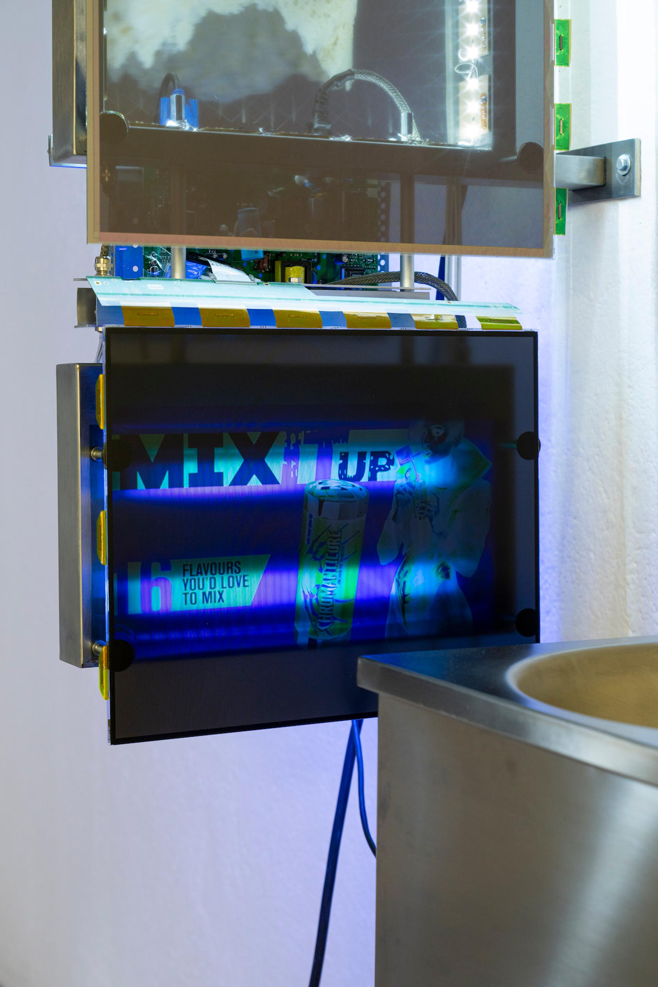 Exhibition View Group Show «Issue de secours; view on Chloé Delarue, TAFAA - FERTILITY DEVICE (NUDGE FOR THE SCAPEGOAT), 2021, Stainless steel, Neon, Polyurethan foam, Motor, Latex, Cigarettes, LCD screen, Led, Video» at Binz39, Zürich, 2021 / Photo: Claude Barrault / Courtesy: the artists and Binz39