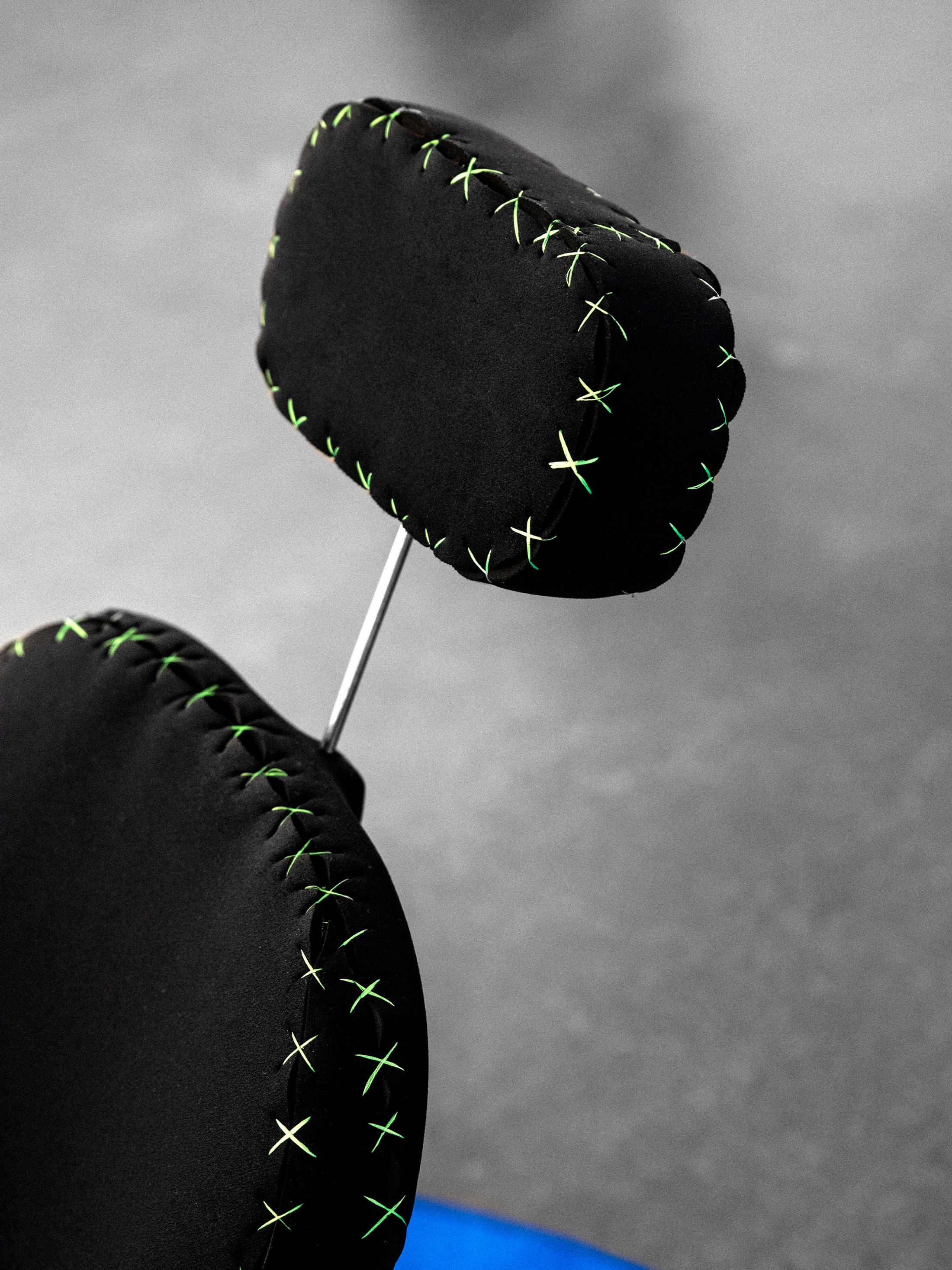 Exhibition View James Bantone Solo Show «He Said, They Said; view on James Bantone, Say No More (detail), 2020 barber chair, neoprene, polyester, metal, blue carpet, 110x140x65 cm» at Coalmine, Winterthur, 2020 / Courtesy: the artist and Coalmine