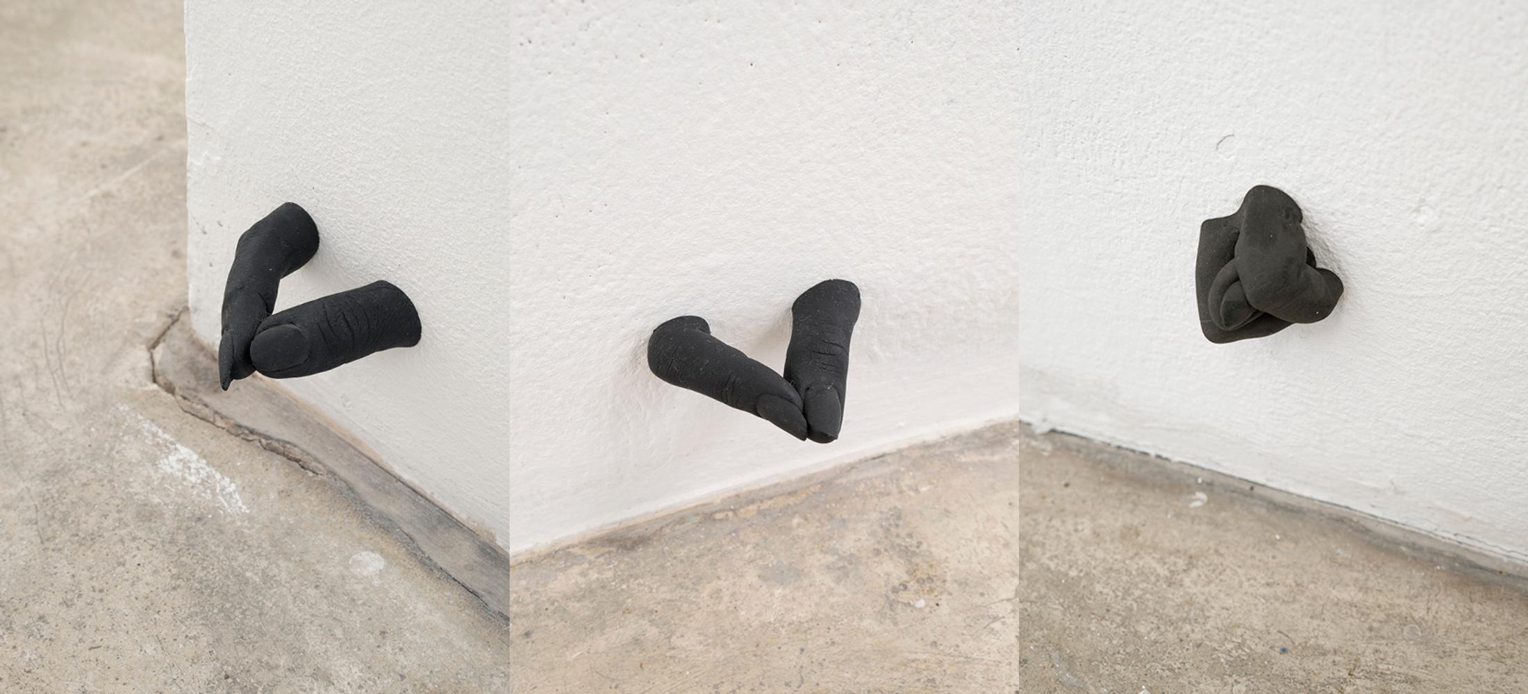 Exhibition View Group Show «THIS MESSAGE COULD BE FOR YOU; view on Elektra Stampoulou, gotcha, 2023, 10 pairs of fingers made of plaster, black pigment, each ca. 10 x 7 x 2 cm» at Milieu, Berne, 2023 / Photo: Claude Barrault / Courtesy: the artist and Milieu