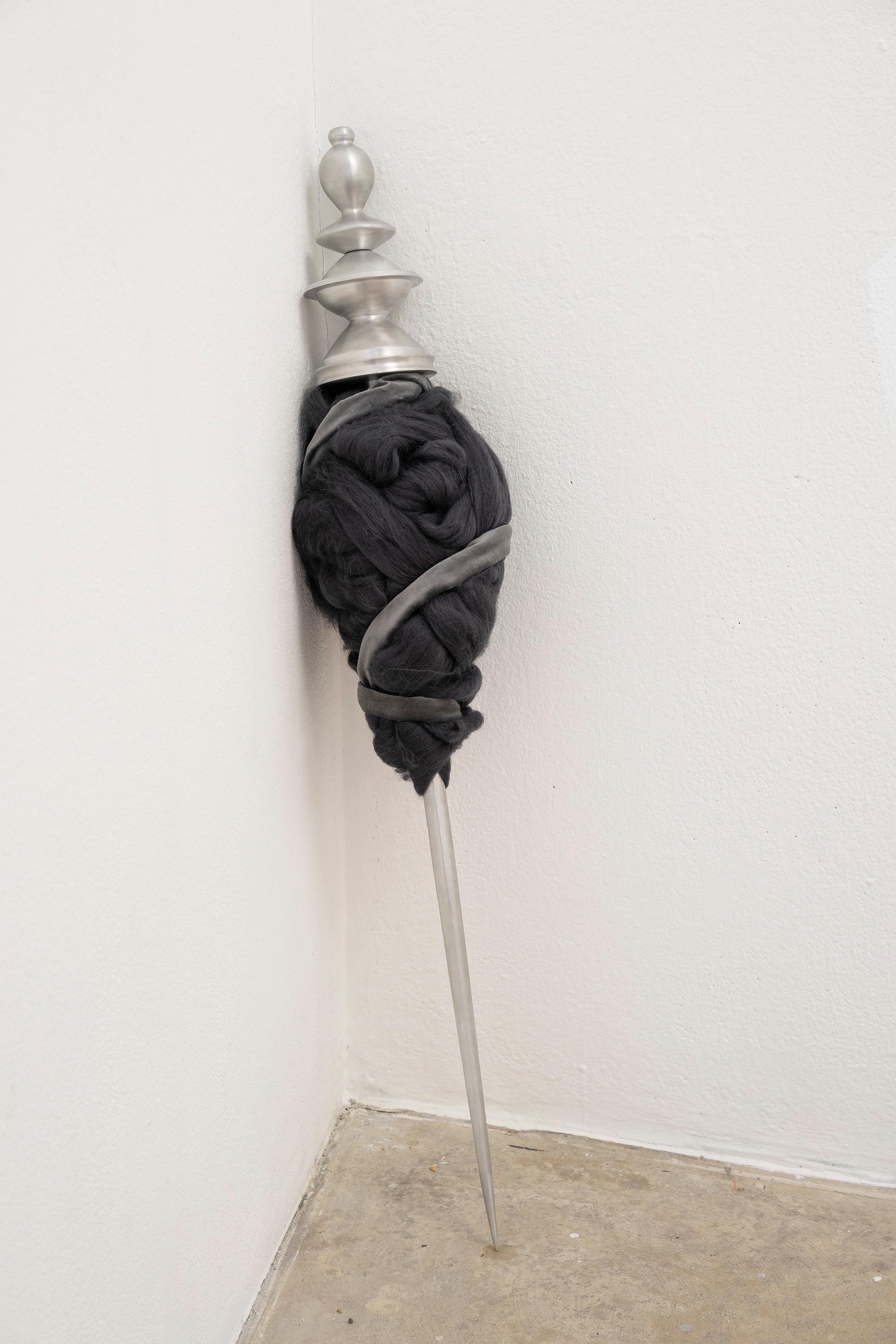 Exhibition View Group Show «THIS MESSAGE COULD BE FOR YOU; view on Elektra Stampoulou, spinster’s bishop, 2023, aluminium, wool, velvet, olfactory components, 93 x 17 cm» at Milieu, Berne, 2023 / Photo: Claude Barrault / Courtesy: the artist and Milieu