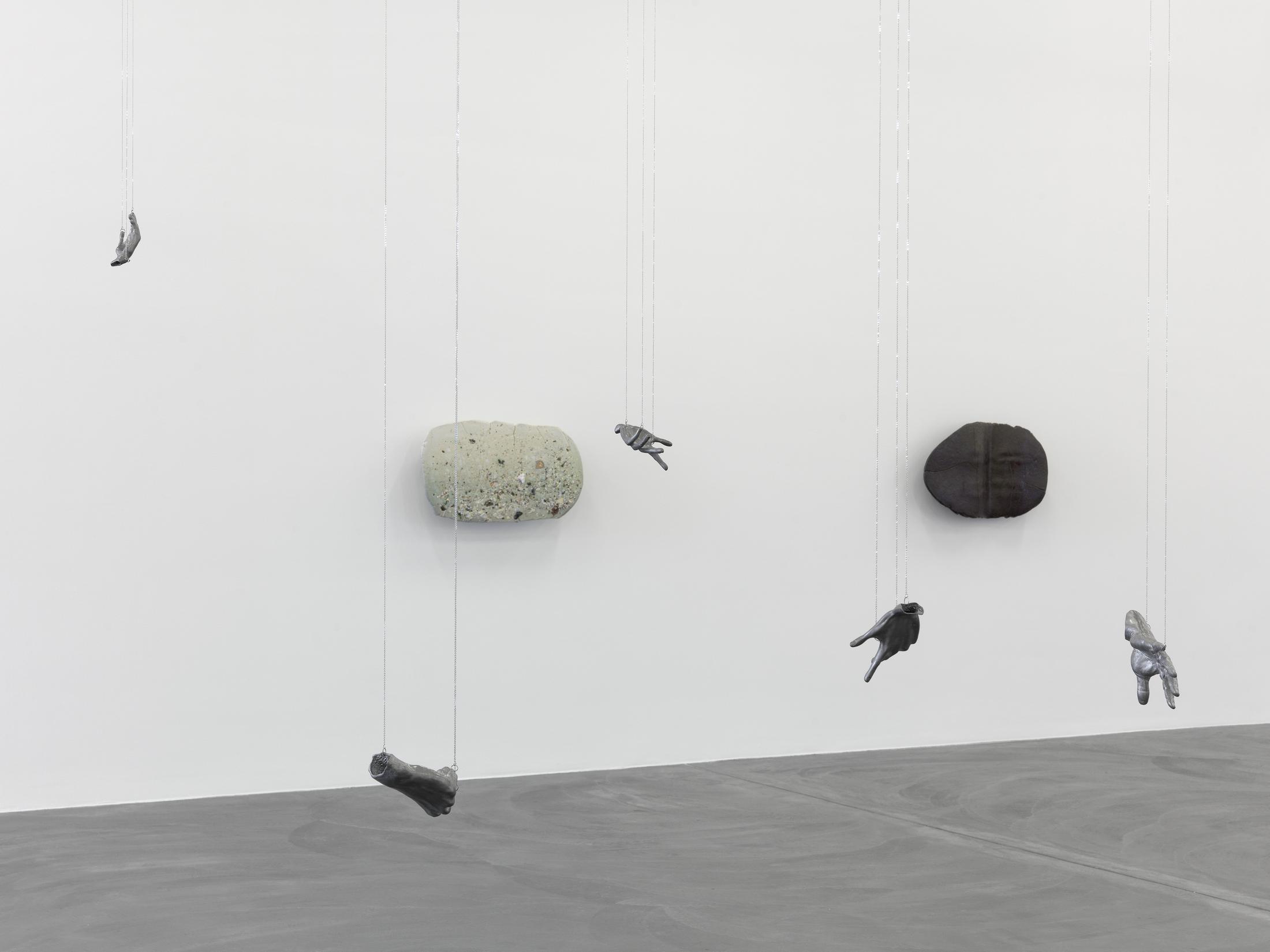 Exhibition View Liz Larner Solo Show «below above; view on Liz Larner, Hands, 1994 (front), ii (calefaction), 2014–2015 and iii (calefaction), 2015 (back)» at Kunsthalle Zürich, Zurich, 2022 / Photo: Annik Wetter / Courtesy: the artist, Sammlung Pakesch and Galerie Max Hetzler