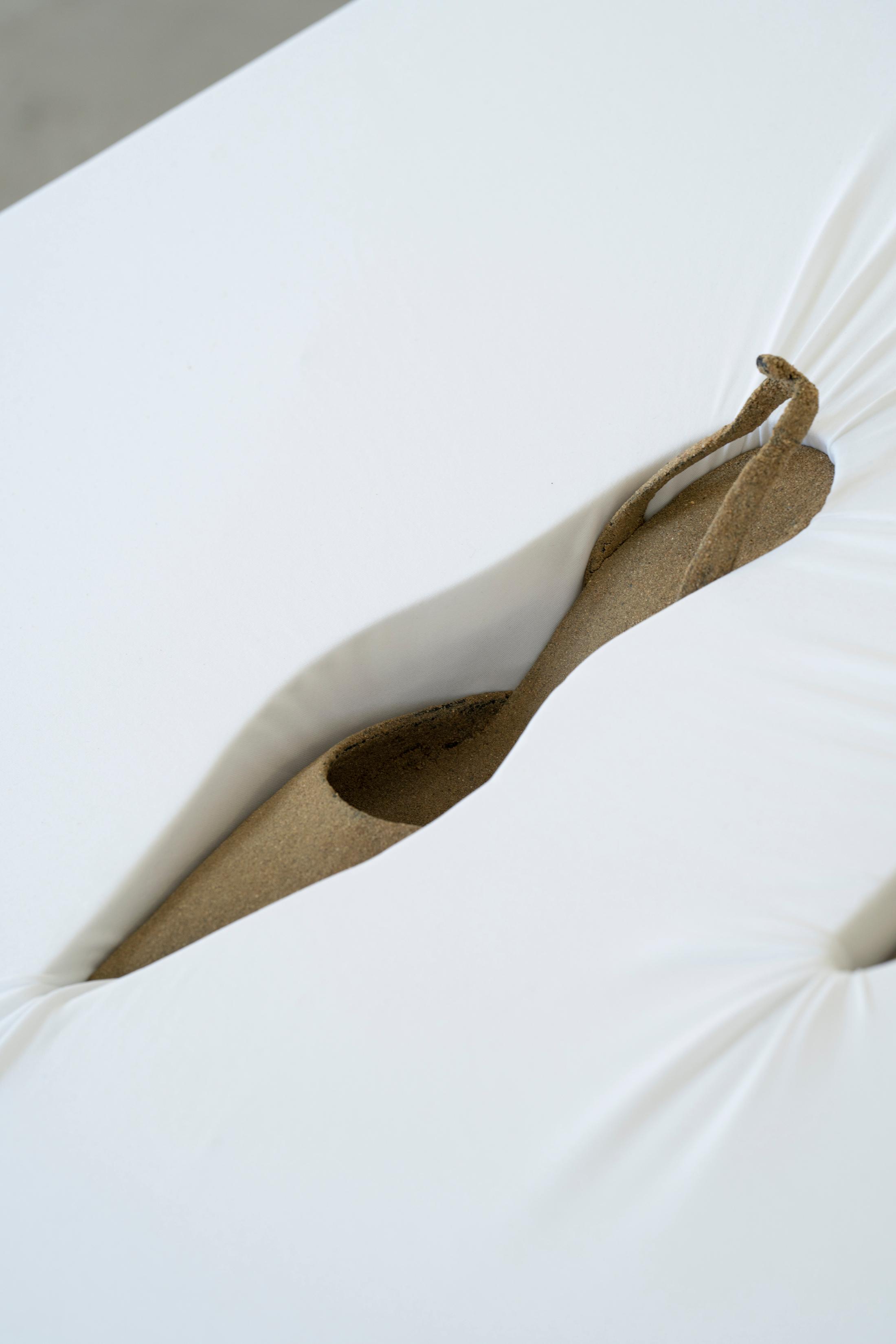 Exhibition View Mara Wohnhaas Solo Show «The fly on a speaker's nose; view on Mara Wohnhaas, The fly on a speaker's nose (Detail), 2023, Wooden board, fabric, acoustic, foam, shows, sand, root, headset microphone, text on paper, steel, nails, staples, 400 x 160 x 80 cm» at Hamlet, Zurich, 2023 / Photo: Claude Barrault / Courtesy: the artist and Hamlet