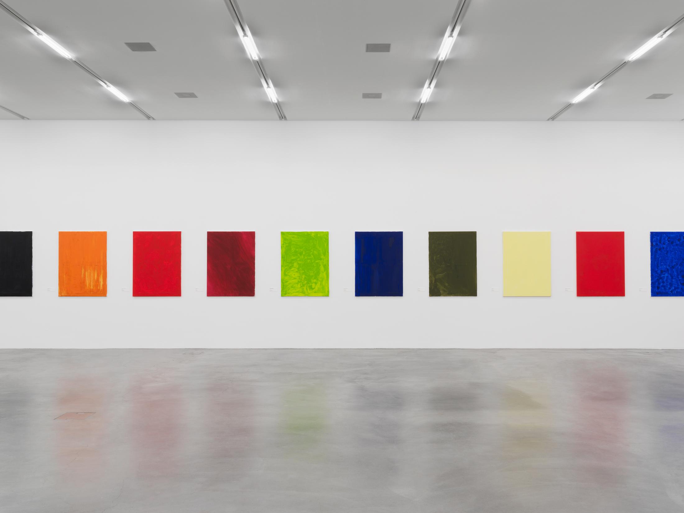 Maria Eichhorn, 72 Bilder (1992–93), 72 monochrome painted canvases, name tags, labeling on the reverse side of the canvases, each 123 x 93 cm, vitrine, Sammlung Migros Museum für Gegenwartskunst, photo: Stefan Altenburger Photography, Zurich © ProLitteris, Zürich