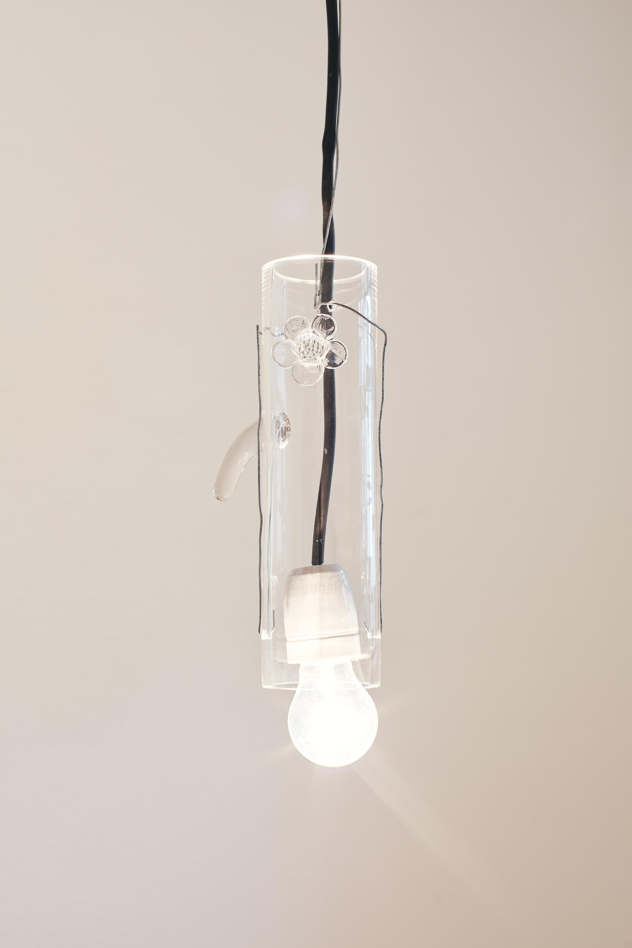 Exhibition View Groupshow «Motor; view on Stefan Burger, Untitled, glass, wire, light bulb, cable, variable dimensions, 2020» at Kunstraum Riehen, Riehen, Basel, 2020 / Photo: Moritz Schermbach / Courtesy: the artist