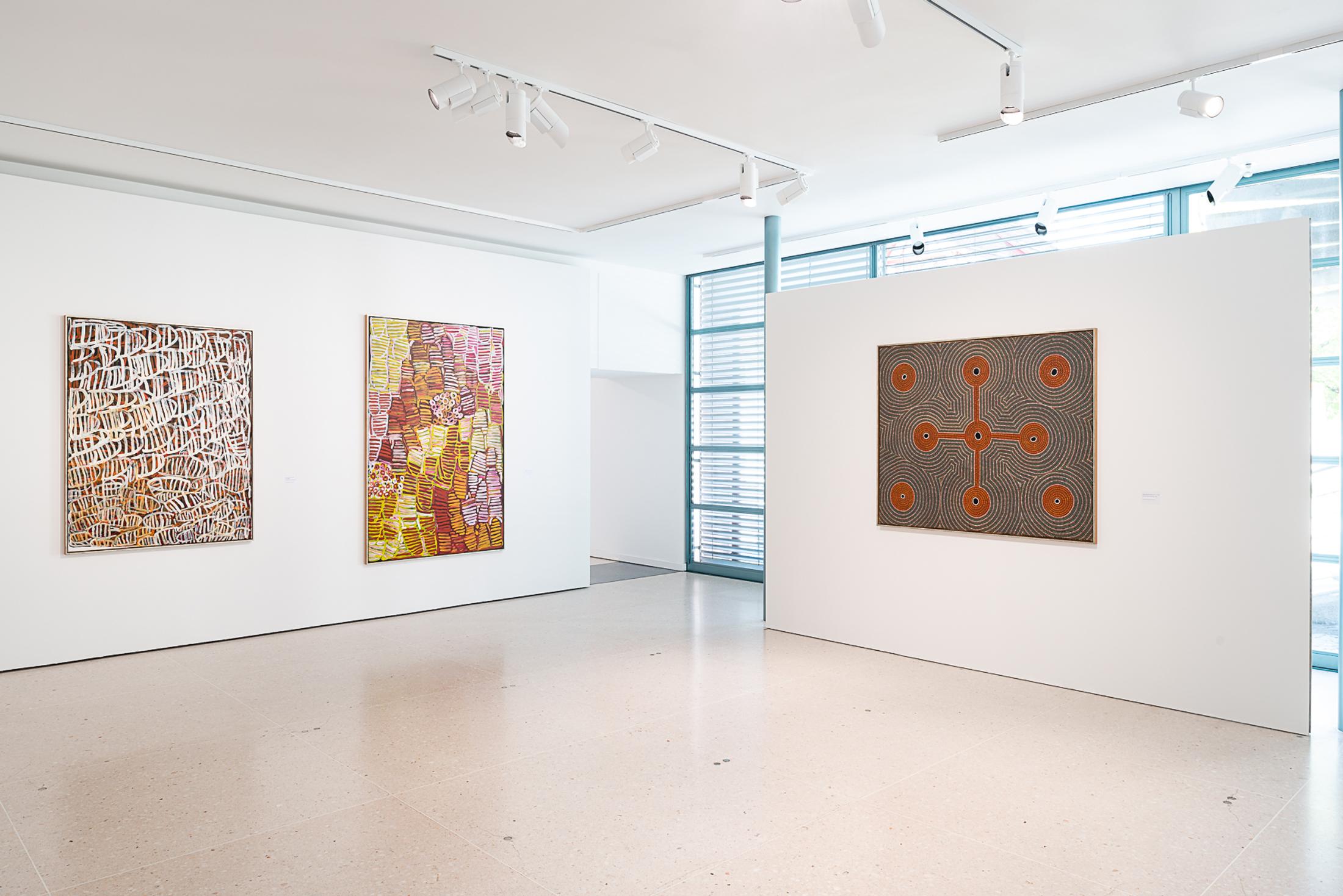 Exhibition View Groupshow «My Mothers Country; view on Minnie Motorcar Pwerle, Awelye Women-Dreaming, 2003 and Awelye Bush Melon Dreaming, 2002; Jimmy Kngale Motorcar, Bush Plum Men’s Dreaming, 1994» at Kunsthaus Zug, Zug, 2019 / Photo: Jorit Aust / Courtesy: the artists, Collection Clement and Kunsthaus Zug